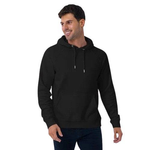 Smiling man wearing a black hoodie and dark jeans, standing against a plain background.