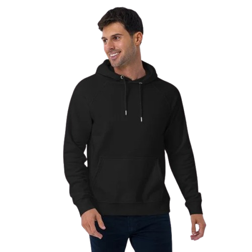 A smiling man in a black hoodie and dark blue jeans standing with his hands in his pockets.