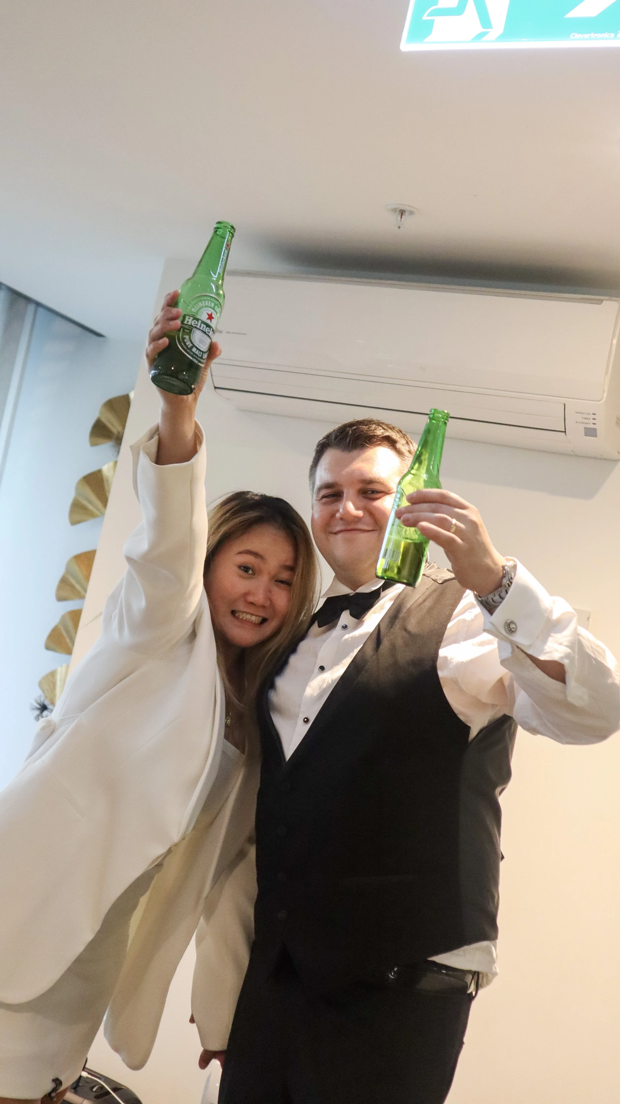 Anne's customers, Matt and Ester sharing a drink at their reception
