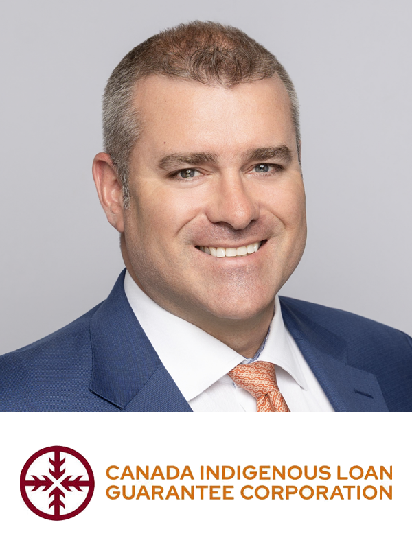 A professional headshot of a smiling man wearing a navy blue suit, white shirt, and a patterned orange tie, with the logo and text of Canada Indigenous Loan Guarantee Corporation below him.