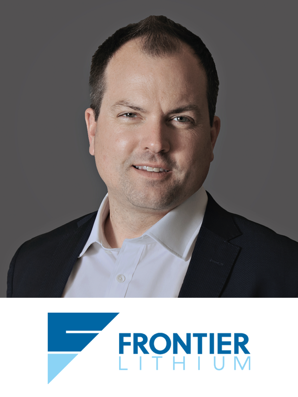 A professional headshot of a man in a suit, with a gray background, displaying the Frontier Lithium logo below.