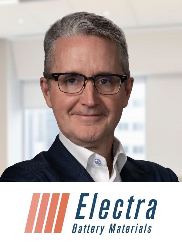 A man with glasses and gray hair smiling in an office setting, with the Electra Battery Materials logo at the bottom of the image.
