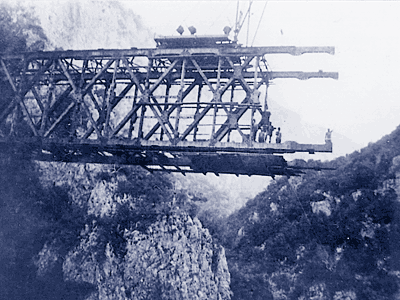 A German soldier 80 meters above the Asopos-river, without harness, but with the so-called Hitler-Nazi-salute