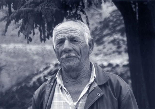 Giannis Gokas from Mousiotitsa survived the execution of 77 women and children by hiding beneath his mother's skirt, July 1943.
