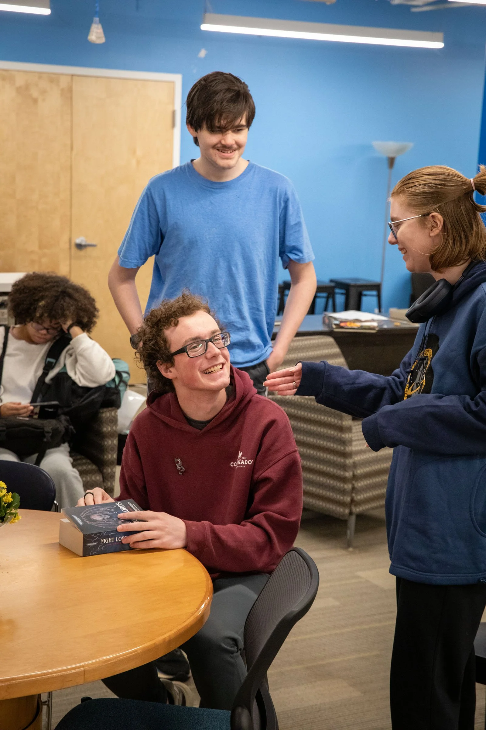 Students chatting and laughing together