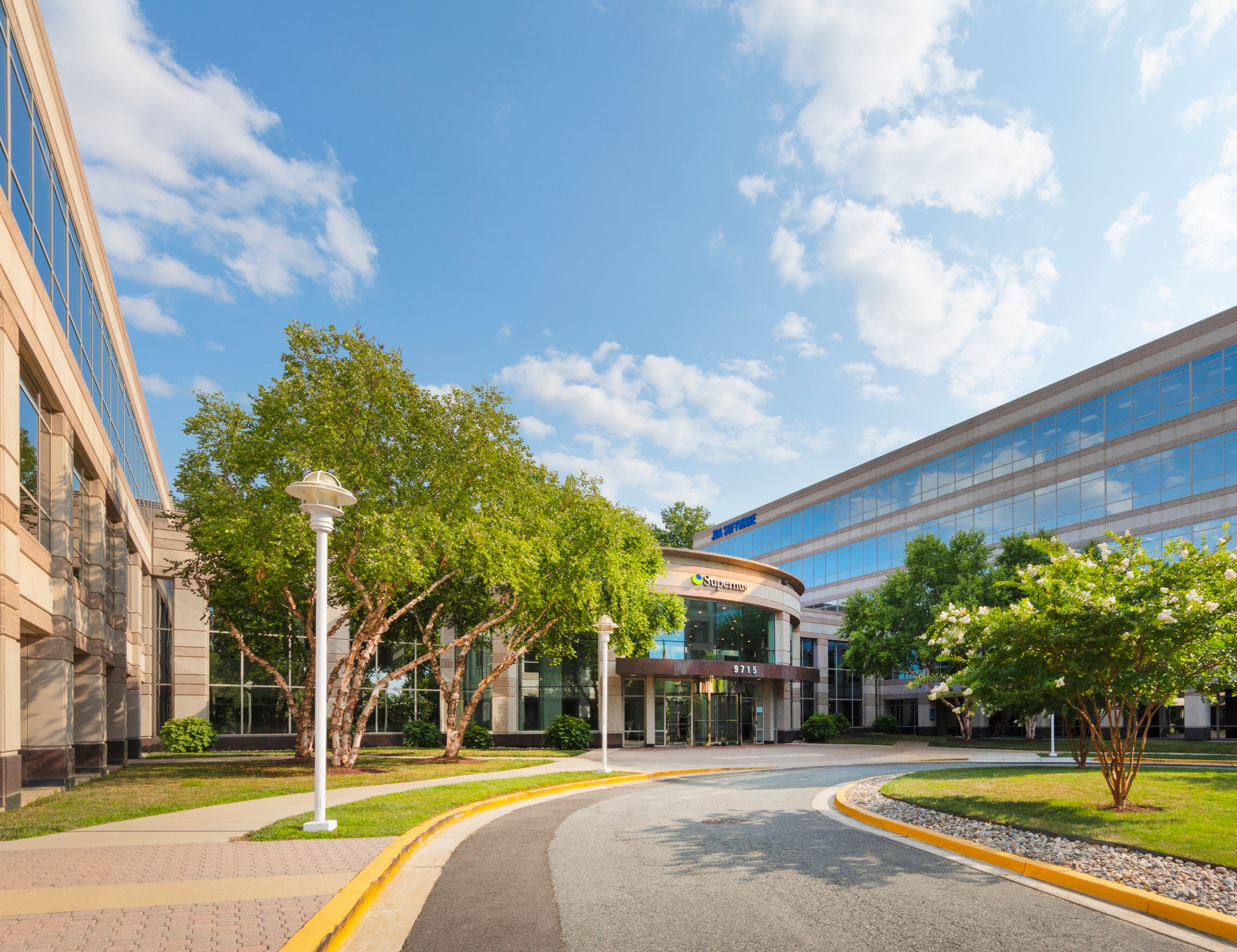 Exterior of Key West Life Science Center in Rockville, Maryland, featuring office and laboratory buildings with glass windows and landscaped grounds.