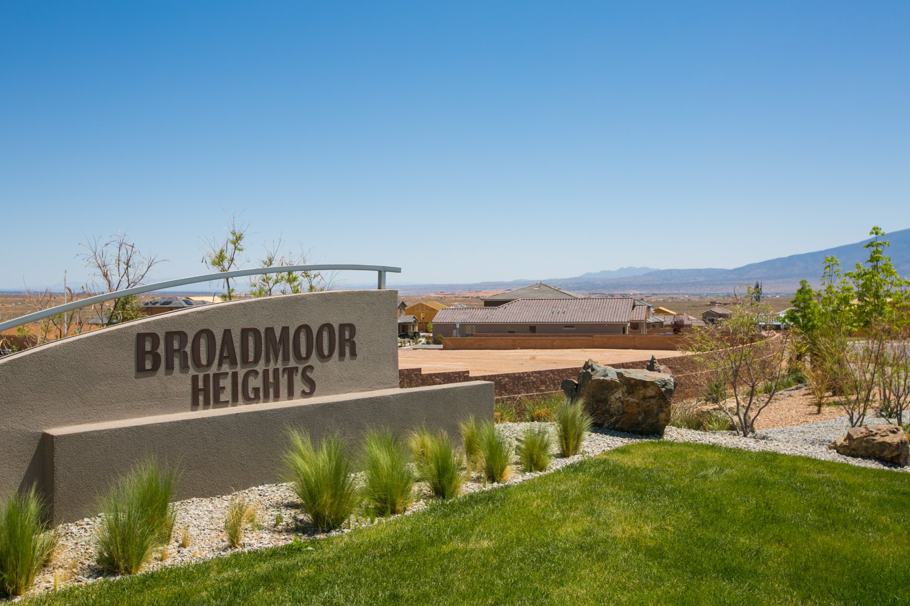 Broadmoor Heights residential community in Rio Rancho, New Mexico, featuring neighborhood homes, landscaped grounds, and mountain views.