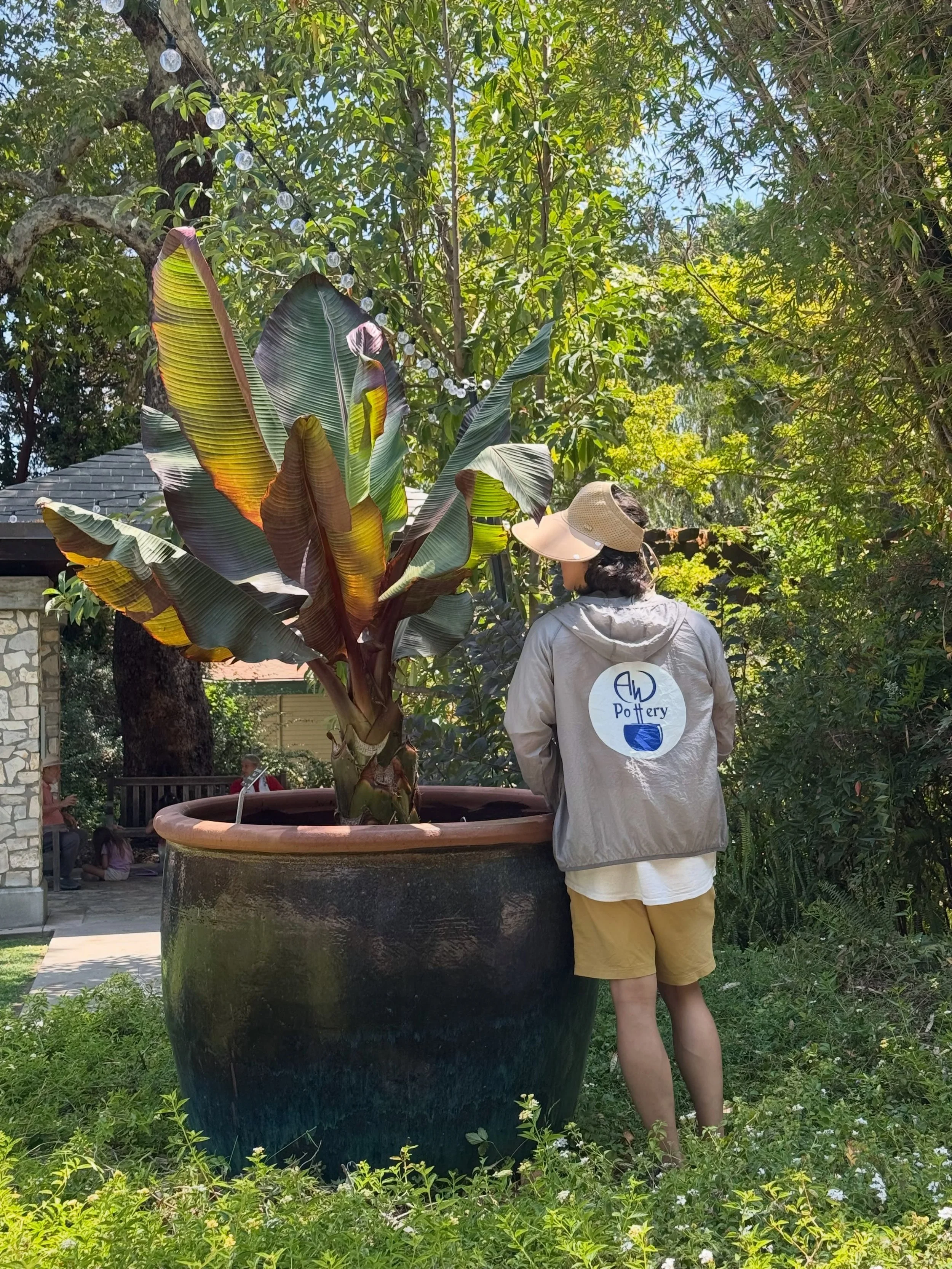 That rustic, deep‑green glaze shifts with the sunlight, and at this scale it turns a red banana plant into living sculpture. When your pottery has roots as strong as your plants, the whole garden levels up. 

Scale matters. Craft matters. AW Potter