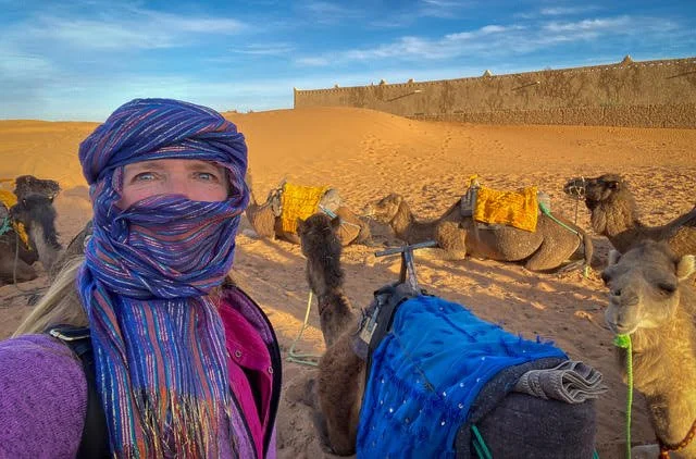 Blonde woman in Sahara Desert