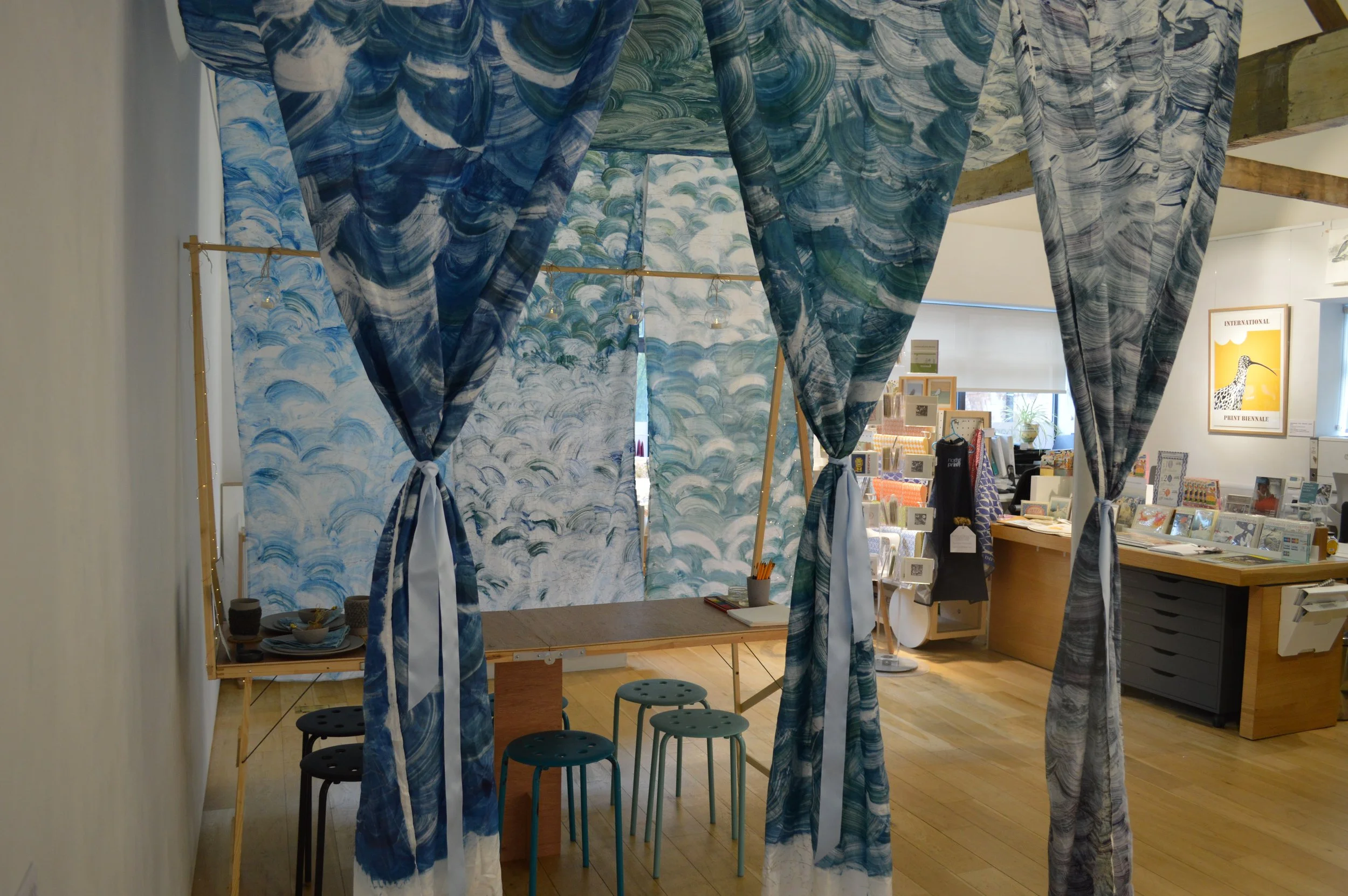 We hung the tent fabric from the building's rafters.
