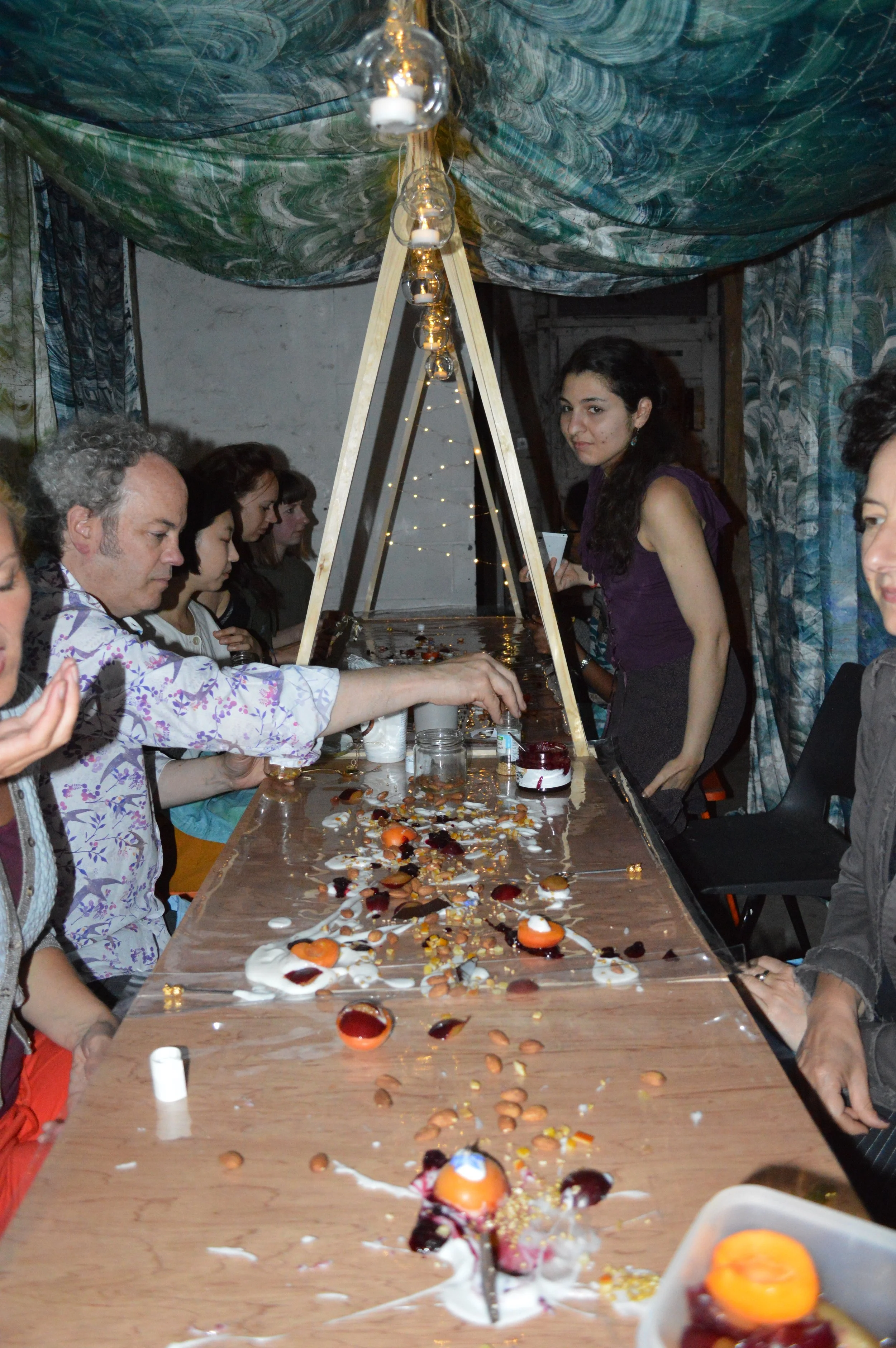 We painted with food to make a collaborative art piece that was then consumed.