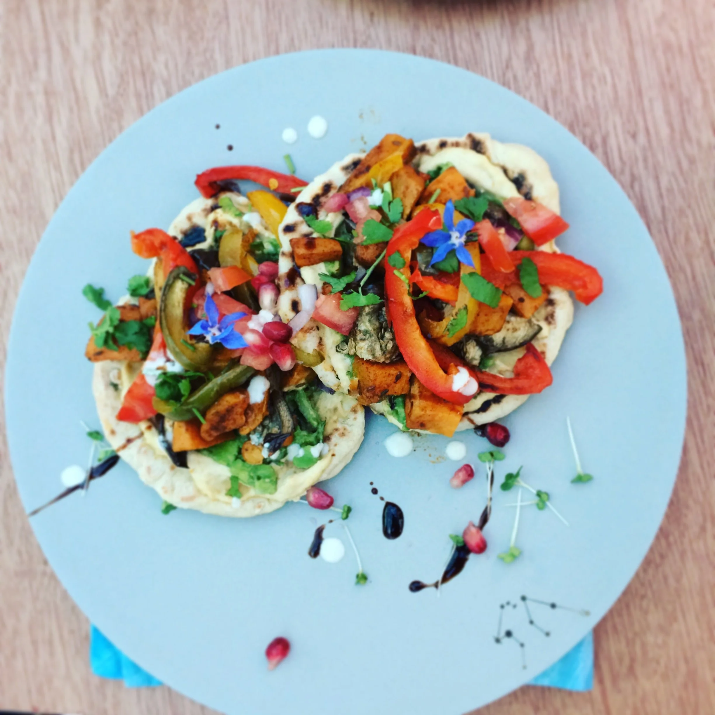 Main: Greek gyros with homemade flatbreads; hummus; limey guacamole; cumin, smoked paprika and cayenne pepper spiced sweet potatoes and roasted chickpeas; roasted peppers and aubergines; lemon and garlic tahini; coriander; balsamic glaze; borage. 
