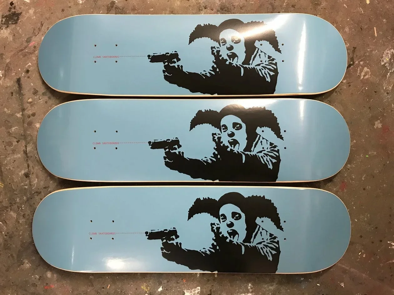 Banky designed three decks for Clown