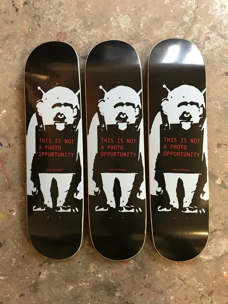 Banky designed three decks for Clown