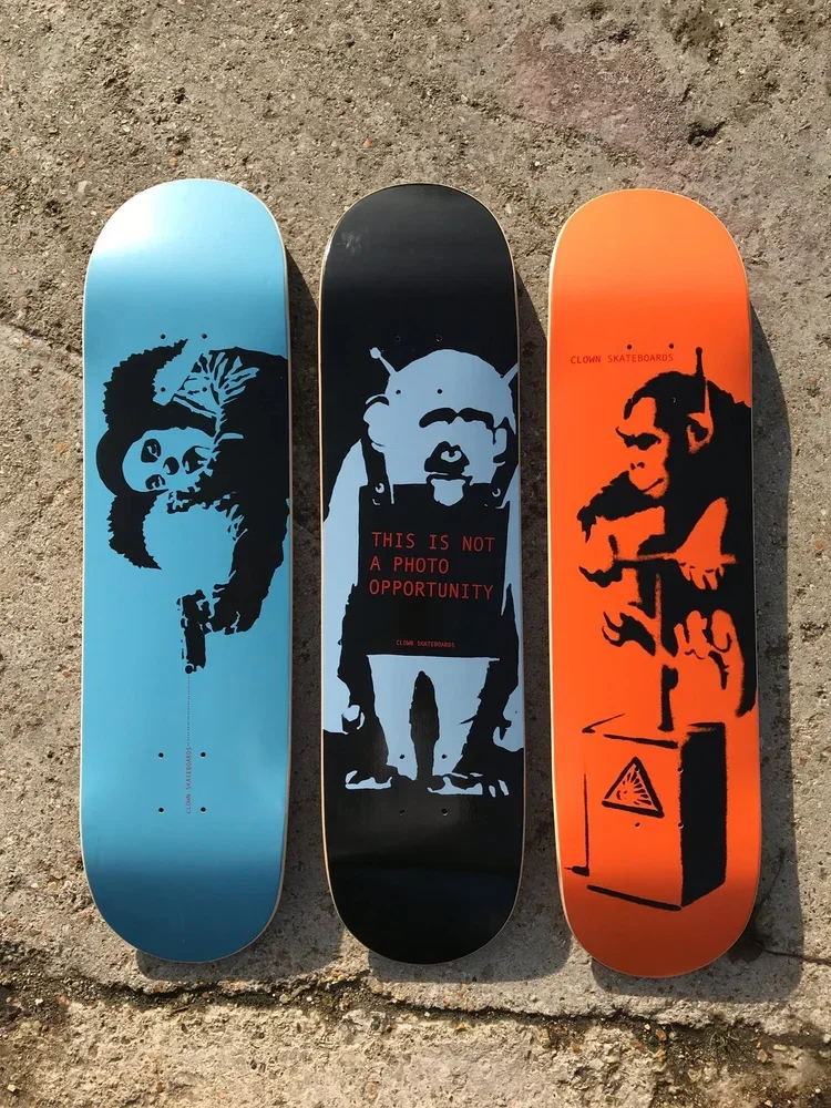 Banky designed three decks for Clown