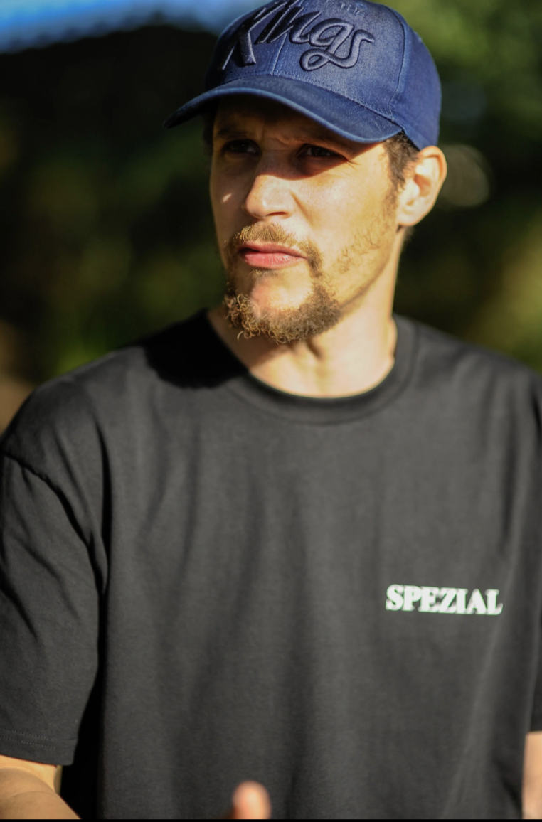 Das SPEZIAL x Reign MC — a British MC known for bold, brutal lyricism.