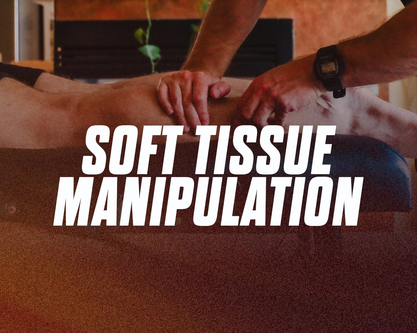A person lying face down receiving a massage on their back, with another person applying pressure with their hands. The text 'Soft Tissue Manipulation' is overlaid on the image.