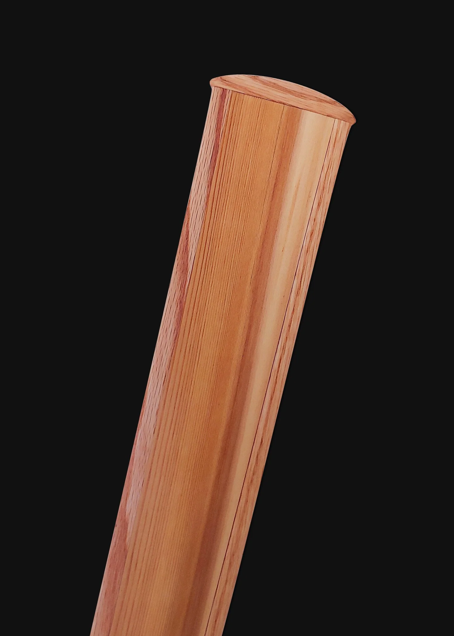 Close-up Traditional Greenland Kayak Paddle Tip. Made out of Western Red Cedar and Oak hardwood blade edges.