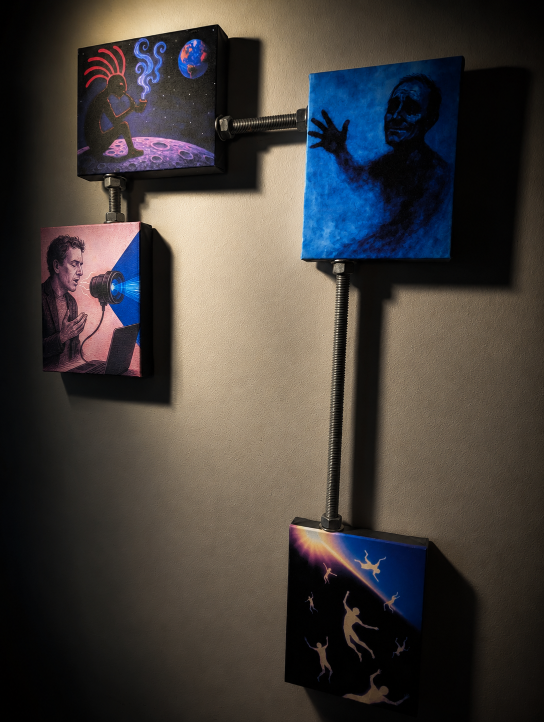 Mixed media artwork on a wall featuring four paintings connected by metal pipes, with a space-themed and surreal style.