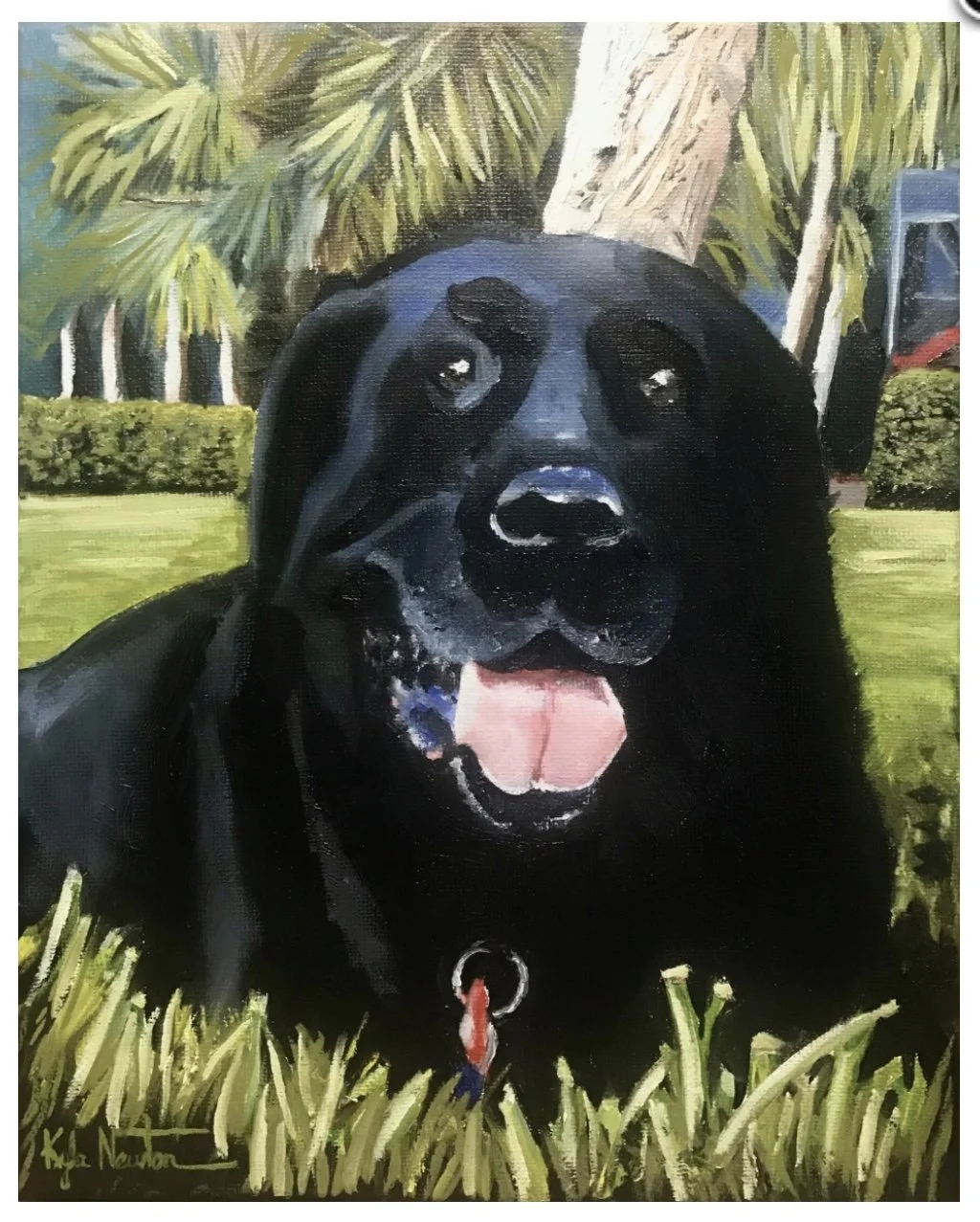 Painting of a black dog with its mouth open and tongue out, lying on green grass with palm trees and a wooden post in the background.