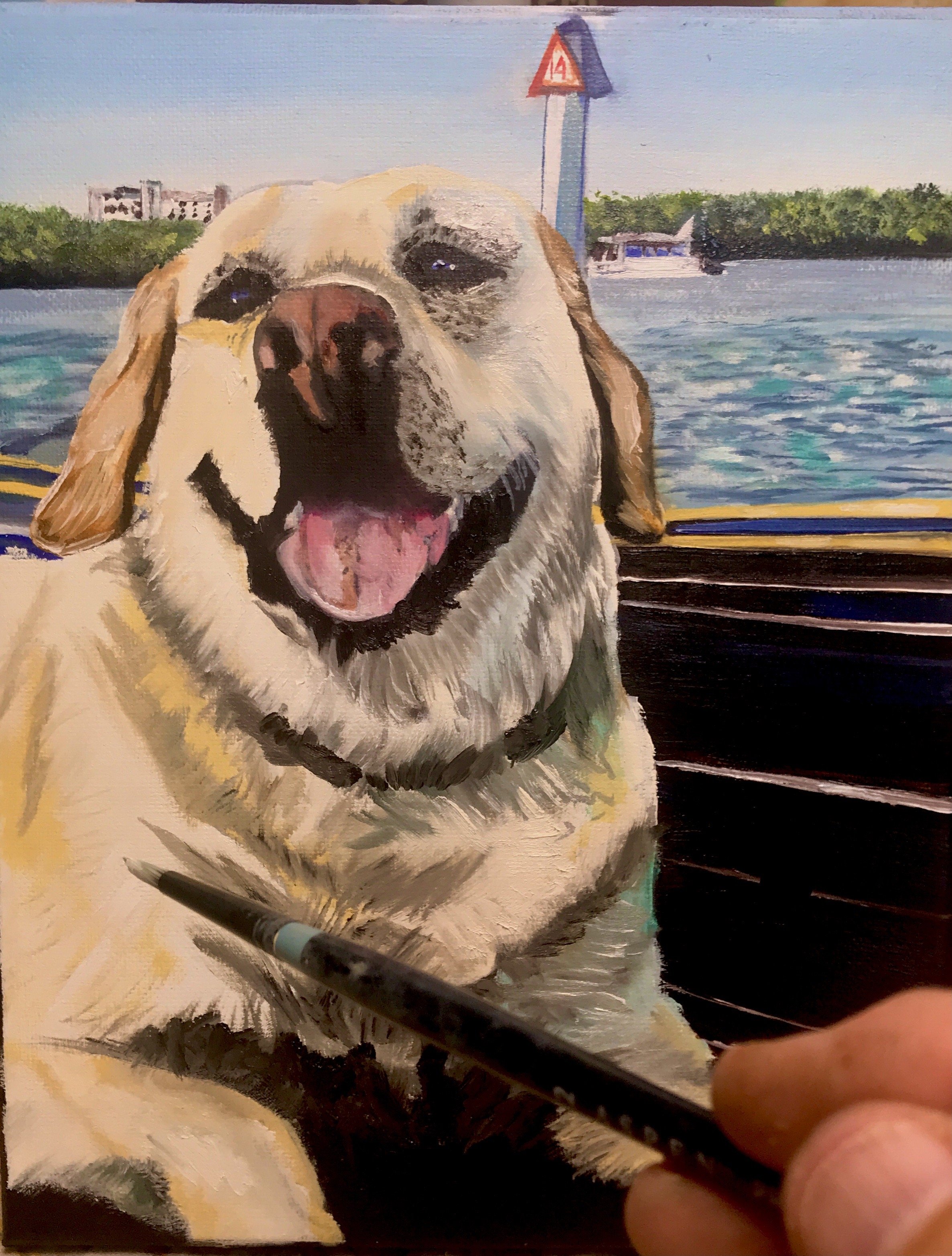 Work-in-progress oil portrait of a smiling golden-colored dog with a boat, water, and trees in the background.