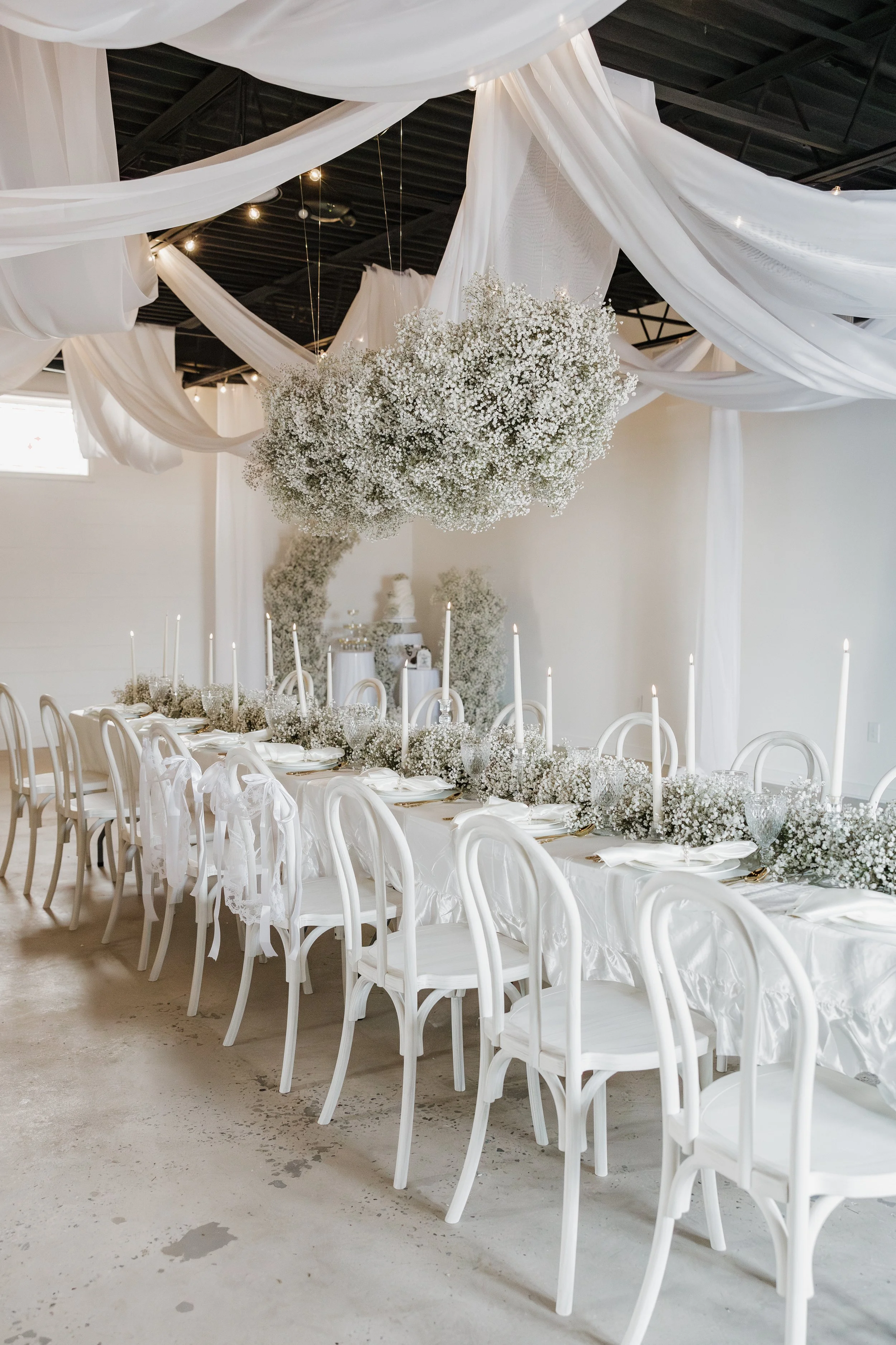 Wedding table setting and floral arrangements at The Ingress in Raleigh