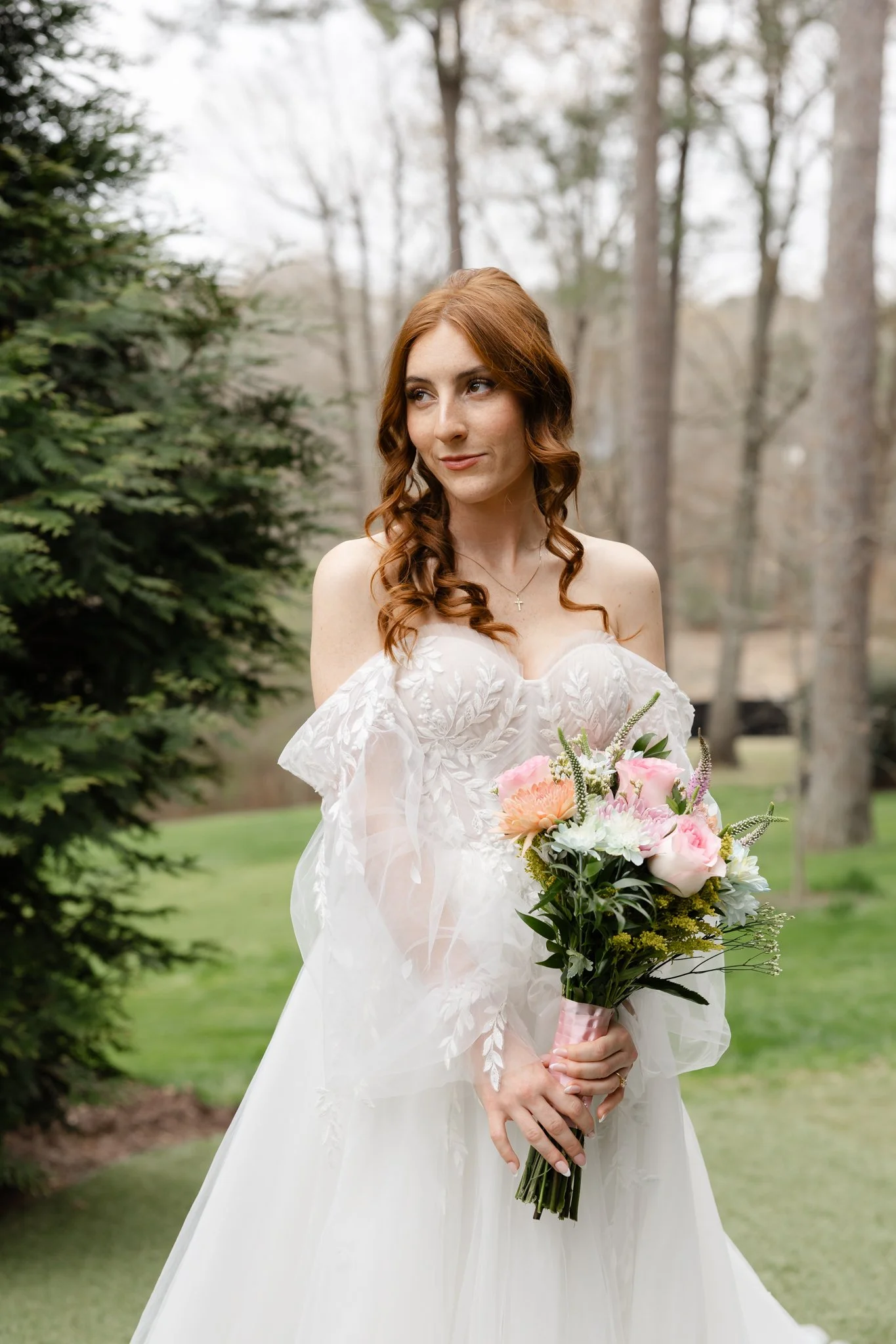 Classic bridal portrait featuring a modern wedding gown at Highgrove Estate