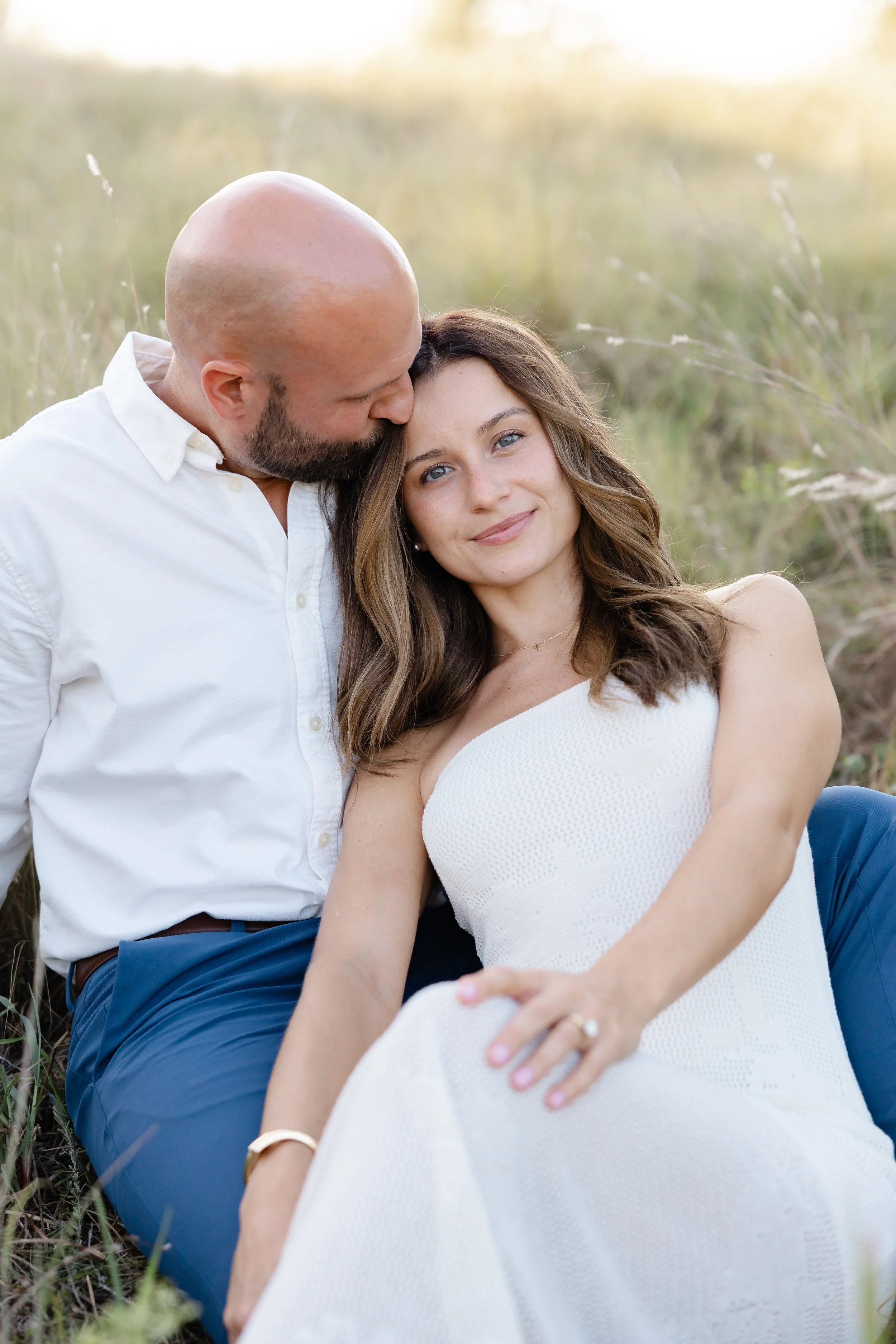 Romantic outdoor engagement photos at the North Carolina Museum of Art Park in Raleigh, NC