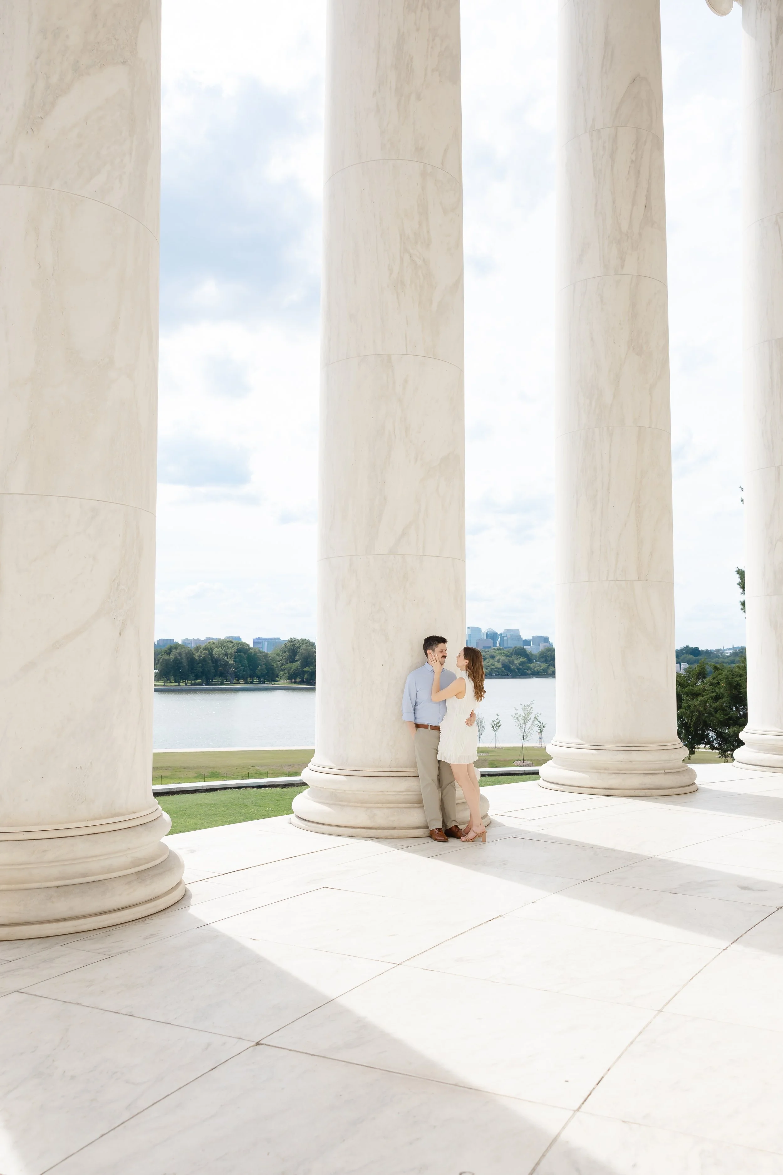 Carole and Tim during their engagement session in Washington, DC with historic architecture in the background