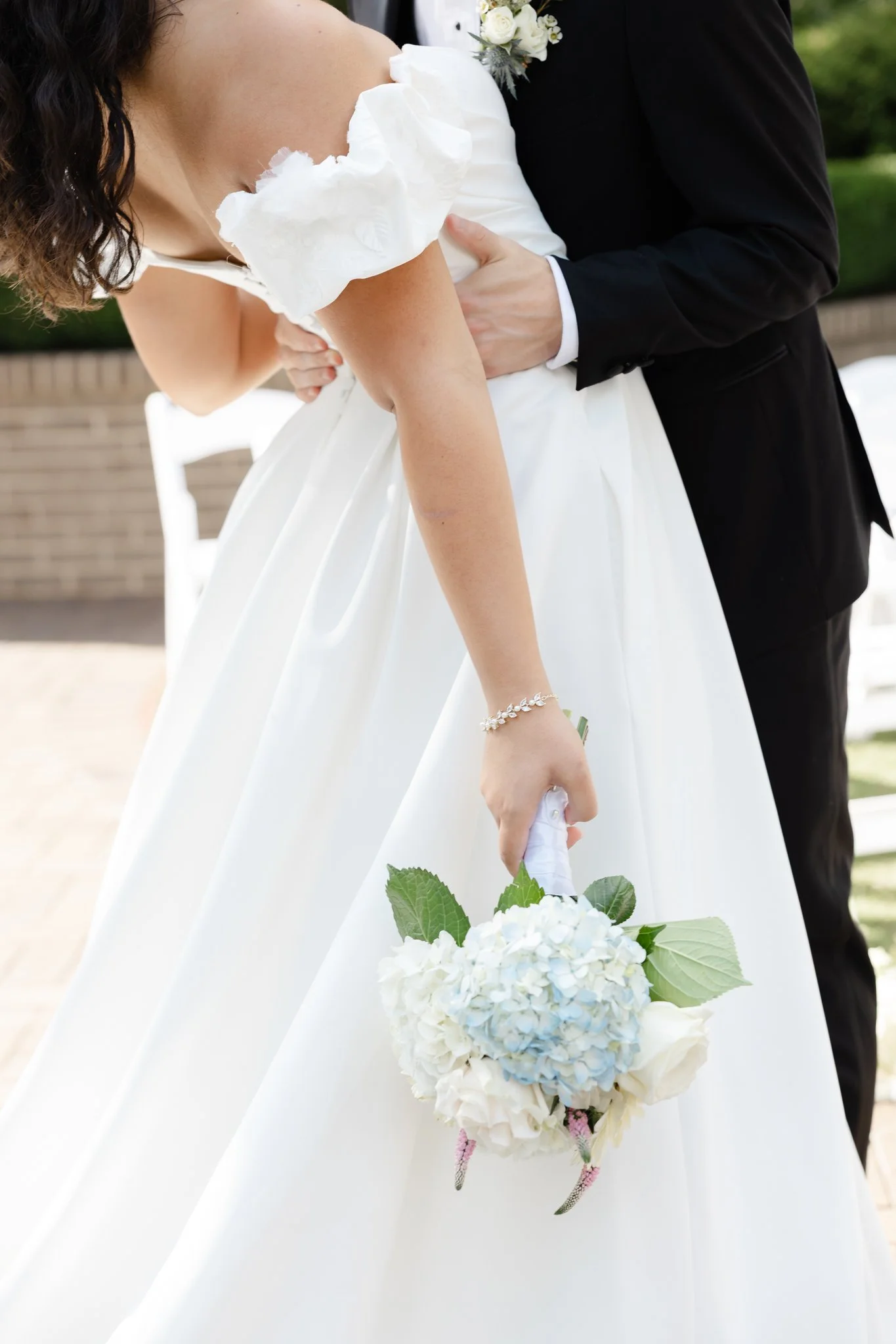 Summer bridal bouquet featuring elegant seasonal florals at Highgrove Estate