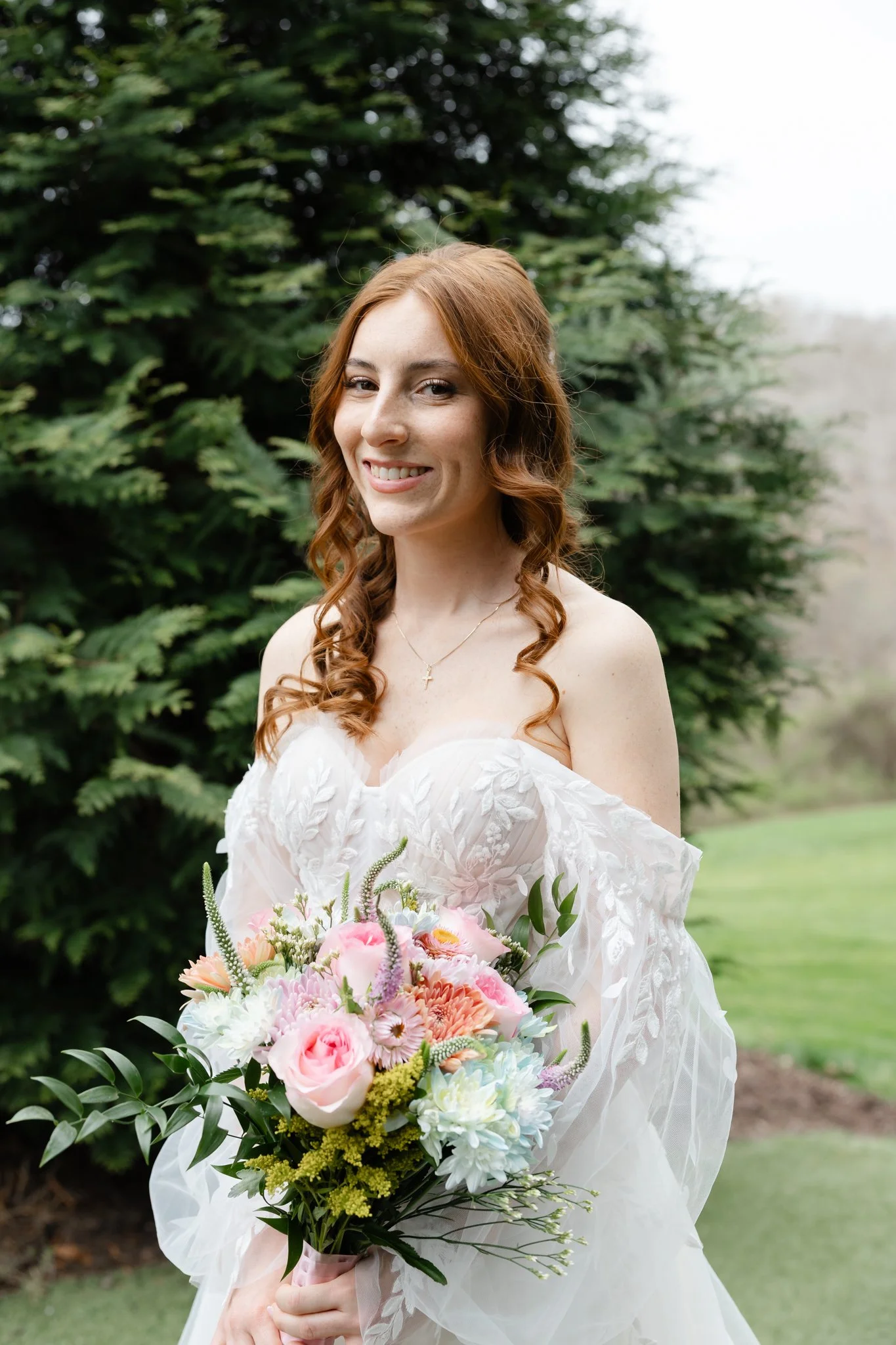 Bride smiling during bridal portraits at Highgrove Estate wedding venue near Raleigh, NC