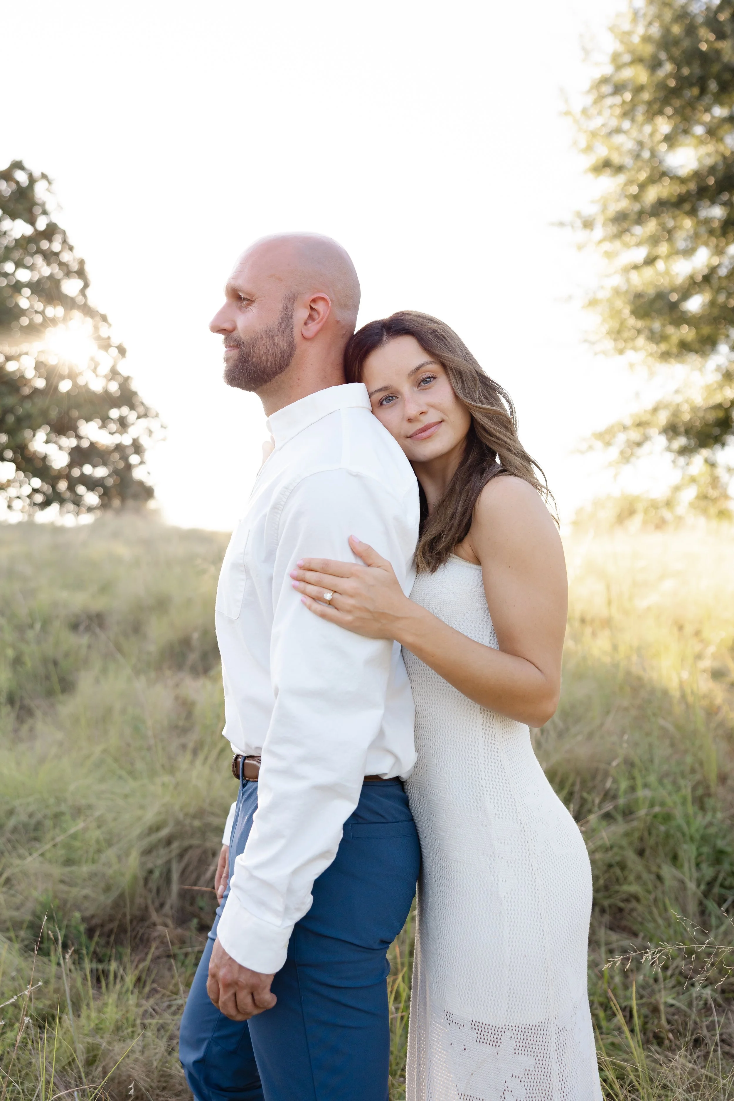 Editorial engagement portrait of Keely and Grant at NCMA Park in Raleigh