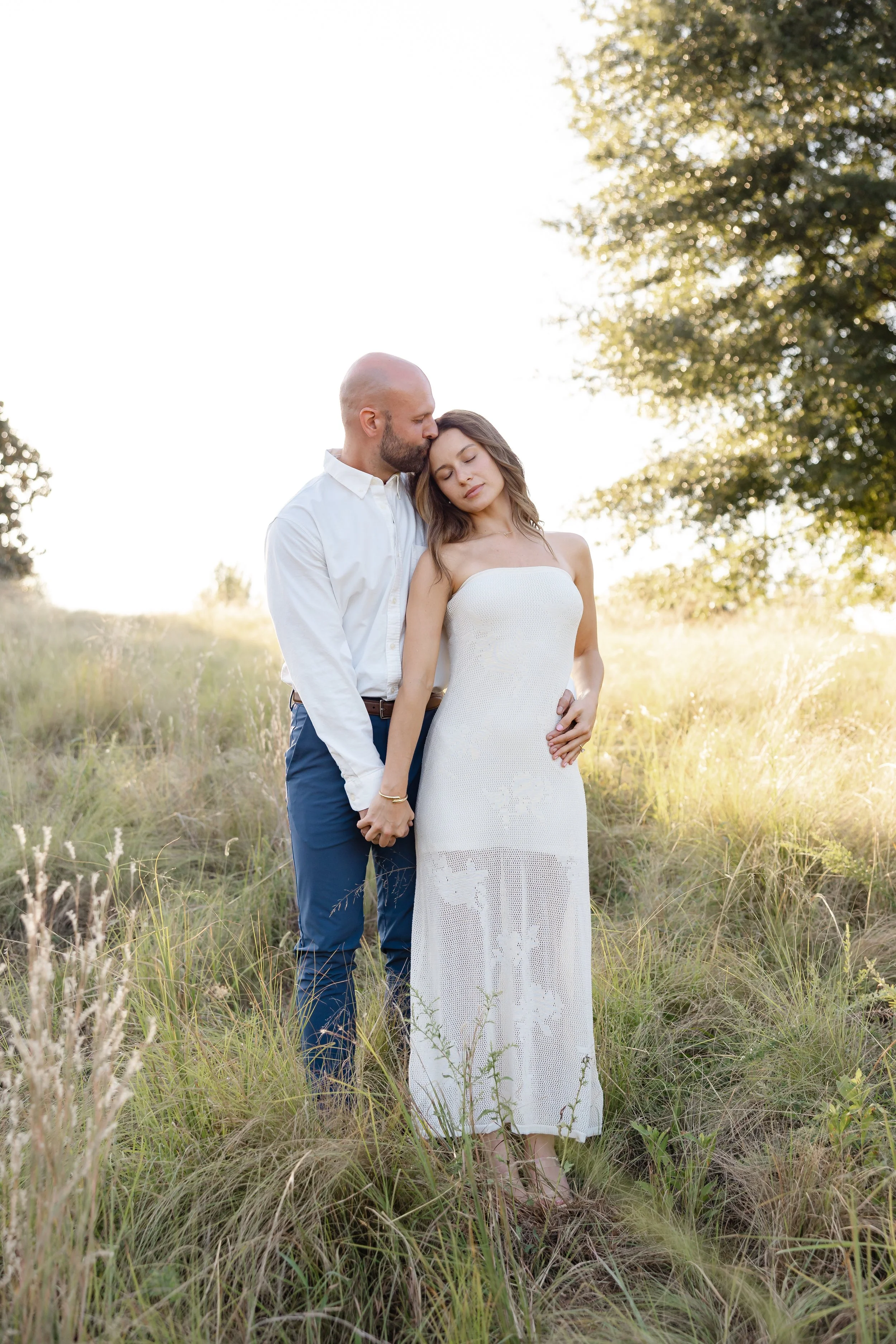 Raleigh engagement photos of Keely and Grant surrounded by the natural scenery at NCMA Park