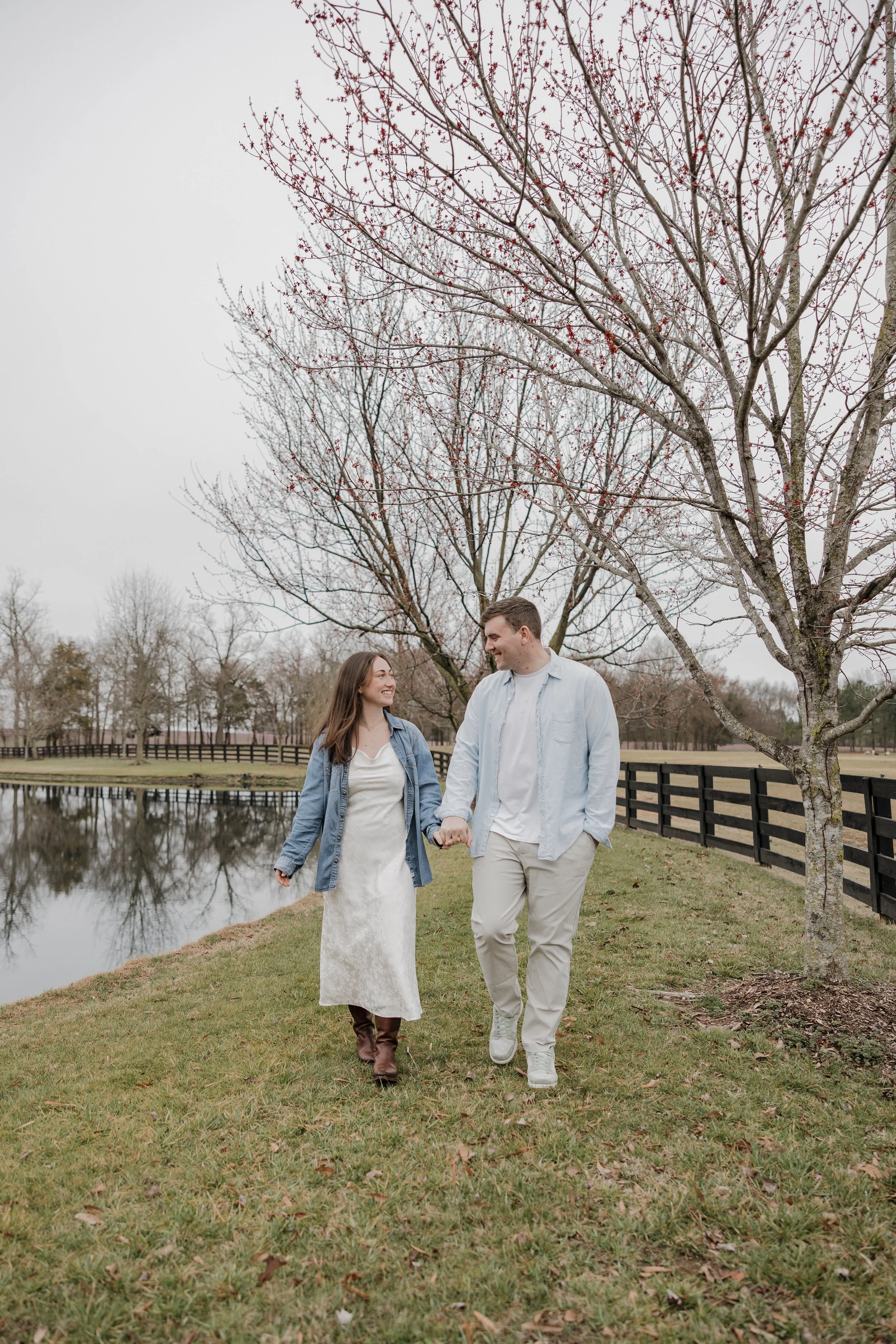 Engagement photos overlooking the scenic grounds of Morning Glory Farm in North Carolina