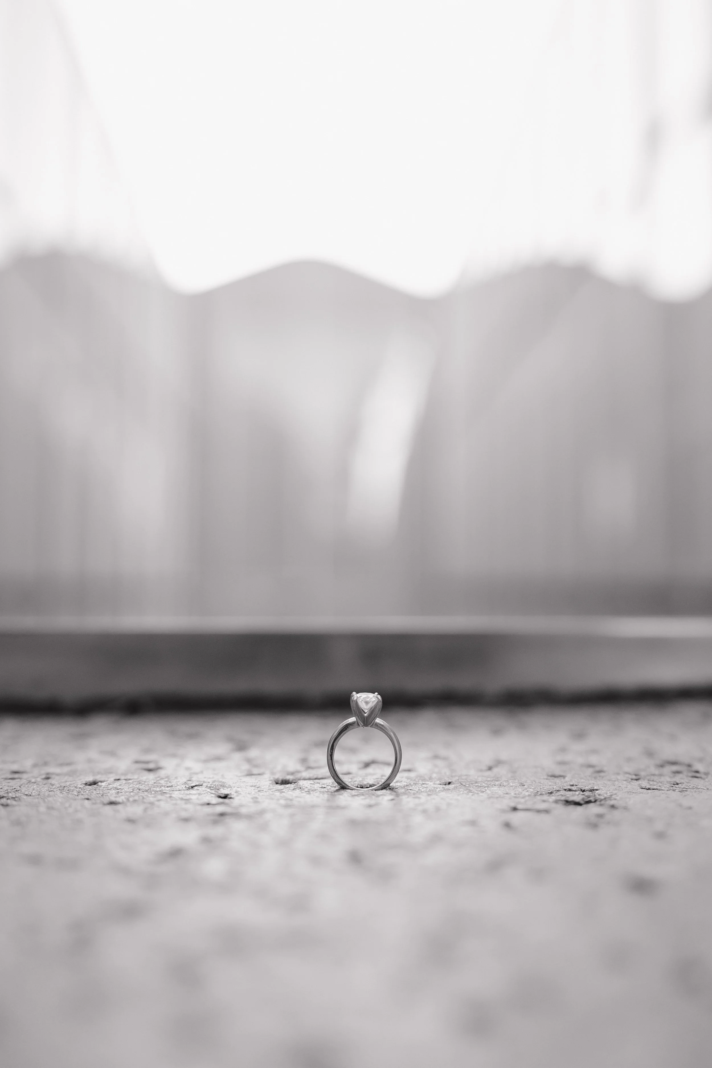 Documentary-style engagement photography of Keely and Grant at NCMA Park
