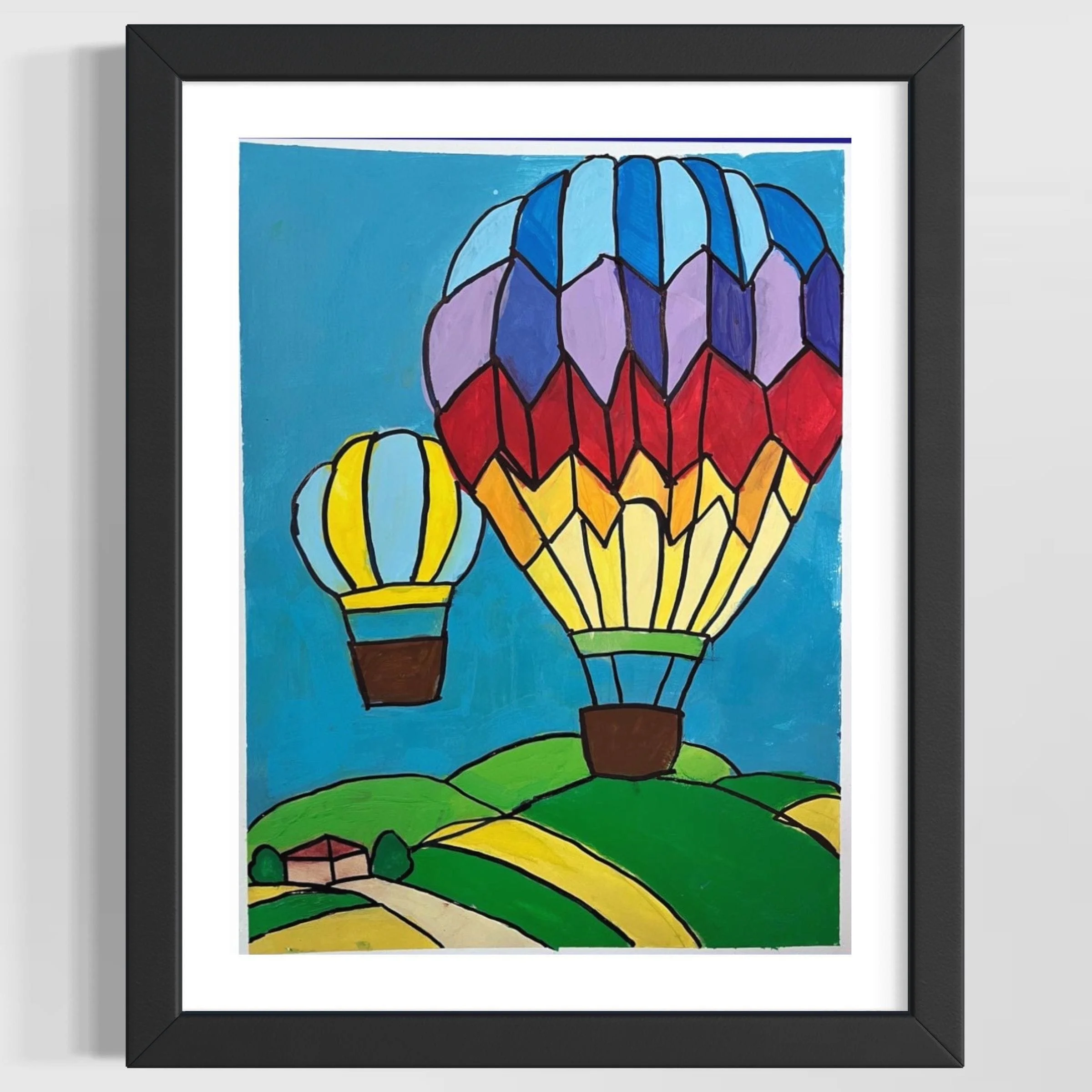 Colorful drawing of hot air balloons in blue, purple, red, yellow, and green, floating over a yellow and green landscape with rolling hills, framed in black.