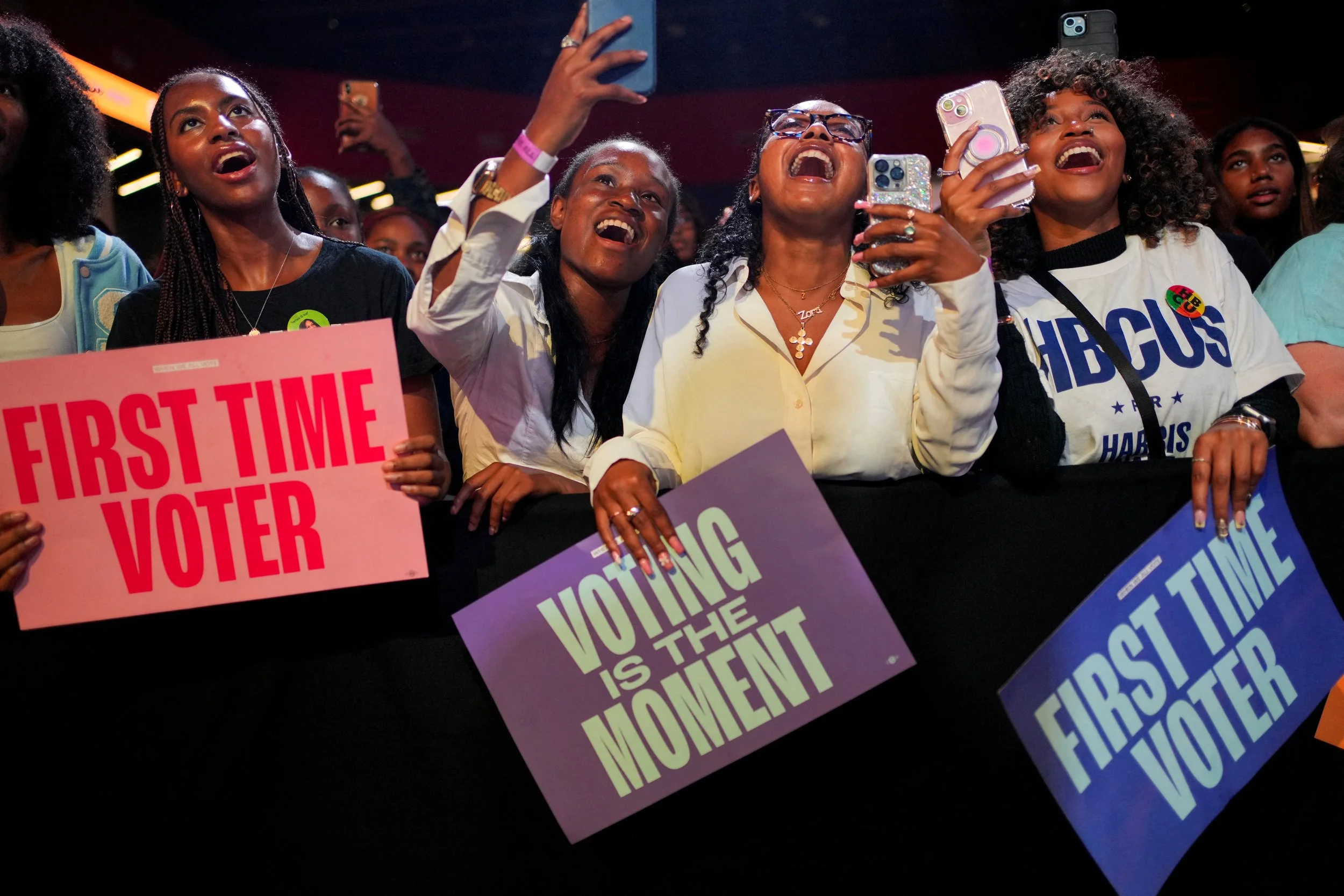 Photo of group of people celebrating voting