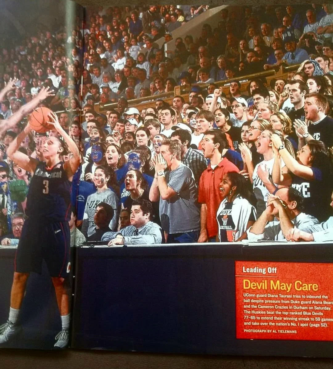 Jeff Goldberg courtside, behind Diana Taurasi