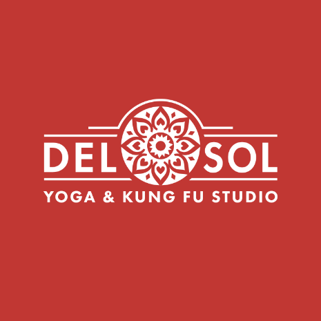 Logo for Del Sol Yoga & Kung Fu Studio on a red background with a circular design in the center.