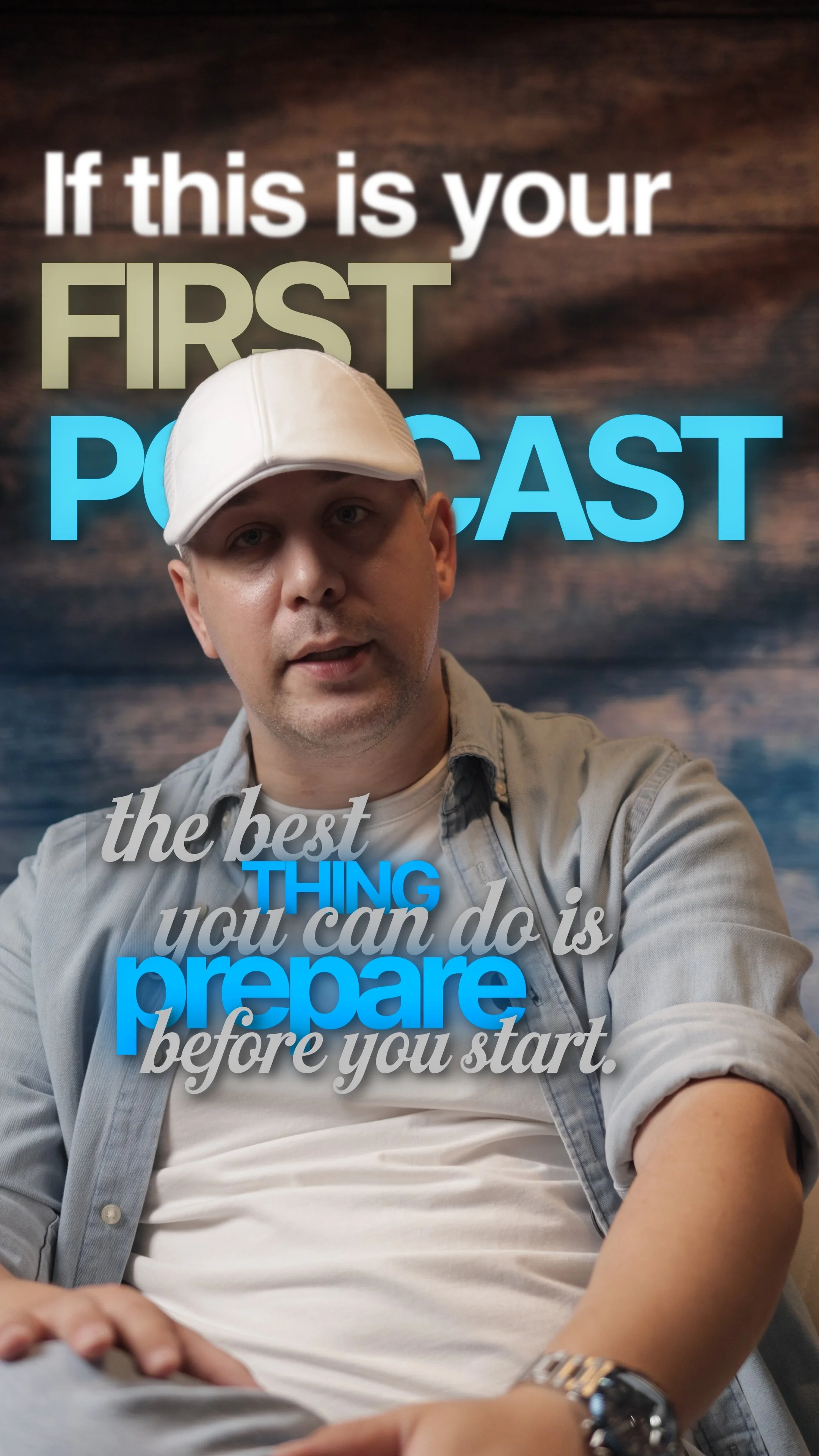 A man wearing a white baseball cap and beige jacket, sitting in front of a backdrop with motivational text about podcasts and preparation.
