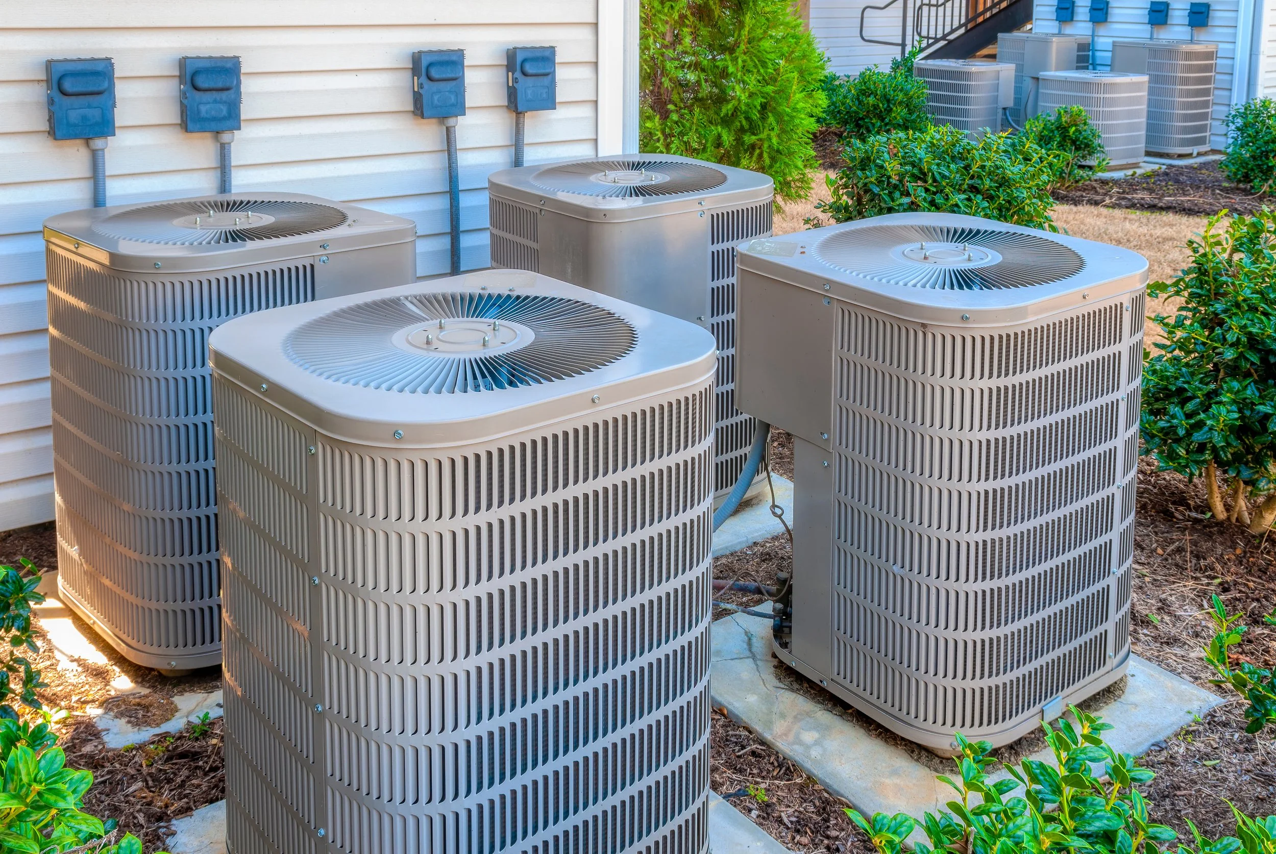 Ooutdoor air conditioning units installed at a residential home.