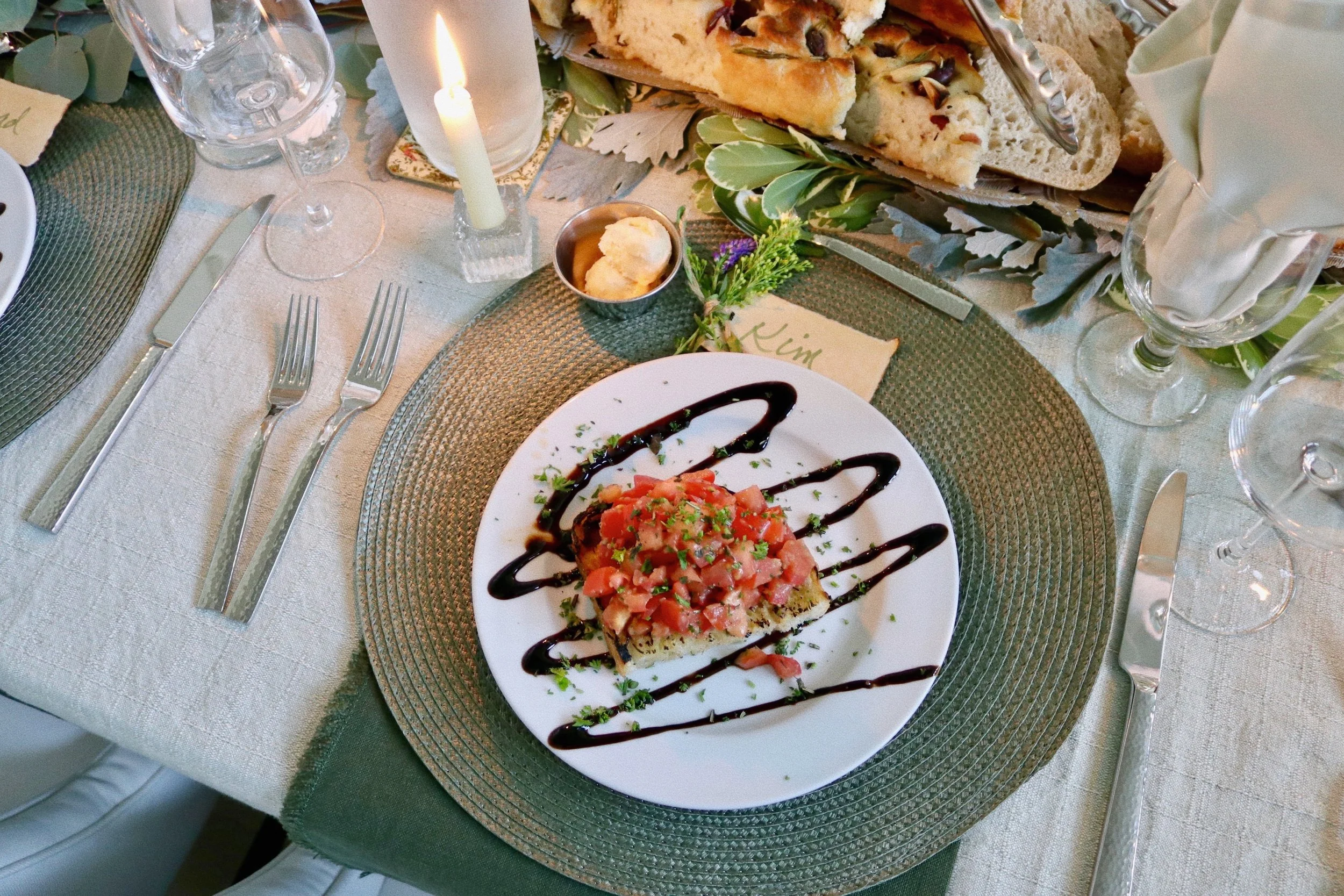 Plated bruschetta appetizer prepared by Silver Platter Catering