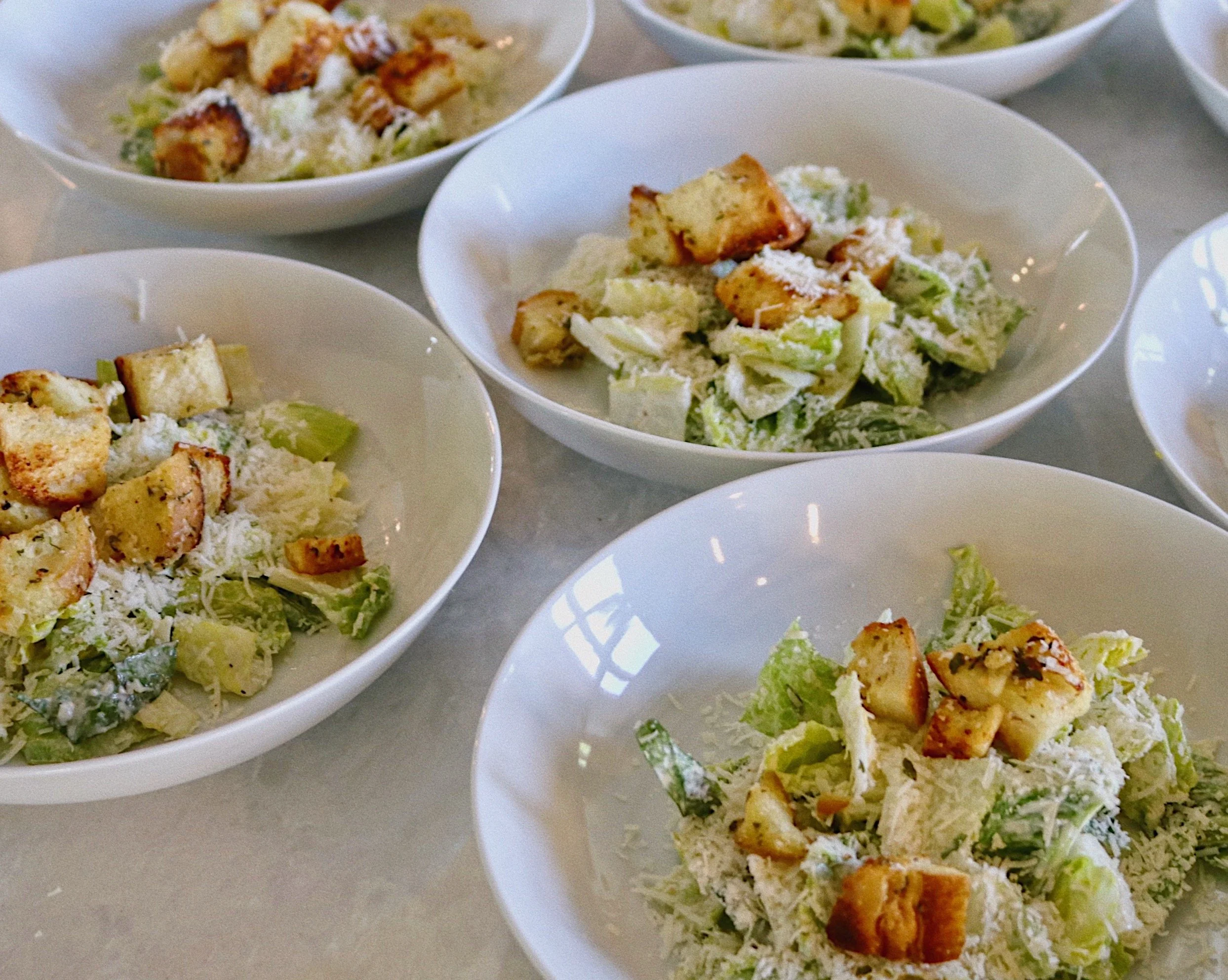 Plated Caesar salad prepared by Silver Platter Catering