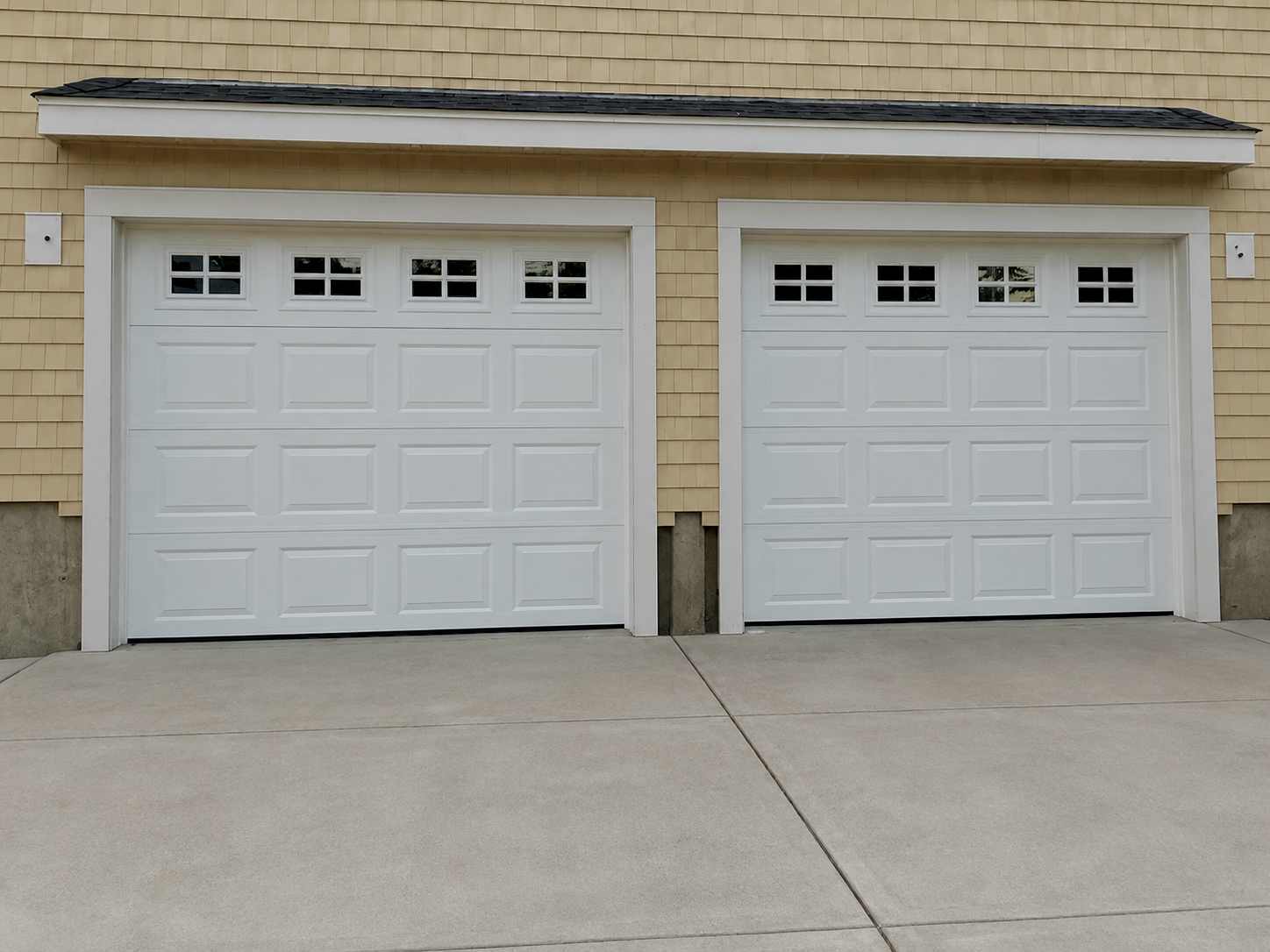 Newly installed garage doors on Lee's Summit home