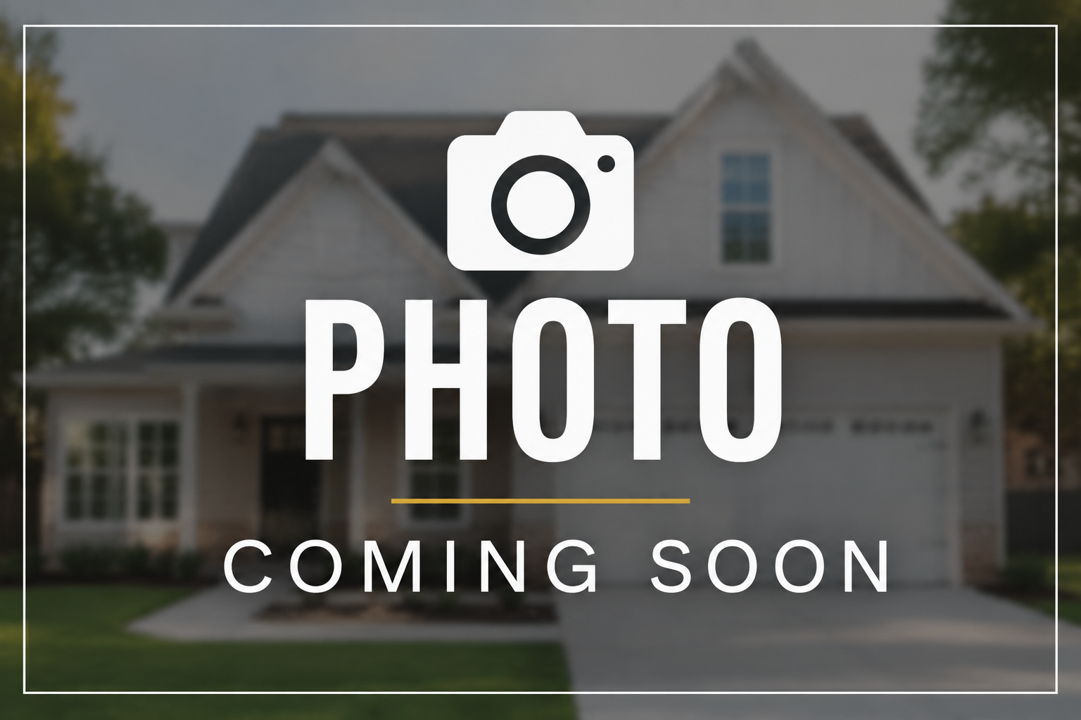 Blurry image of a house with the overlay text 'Photo Coming Soon' and a camera icon.