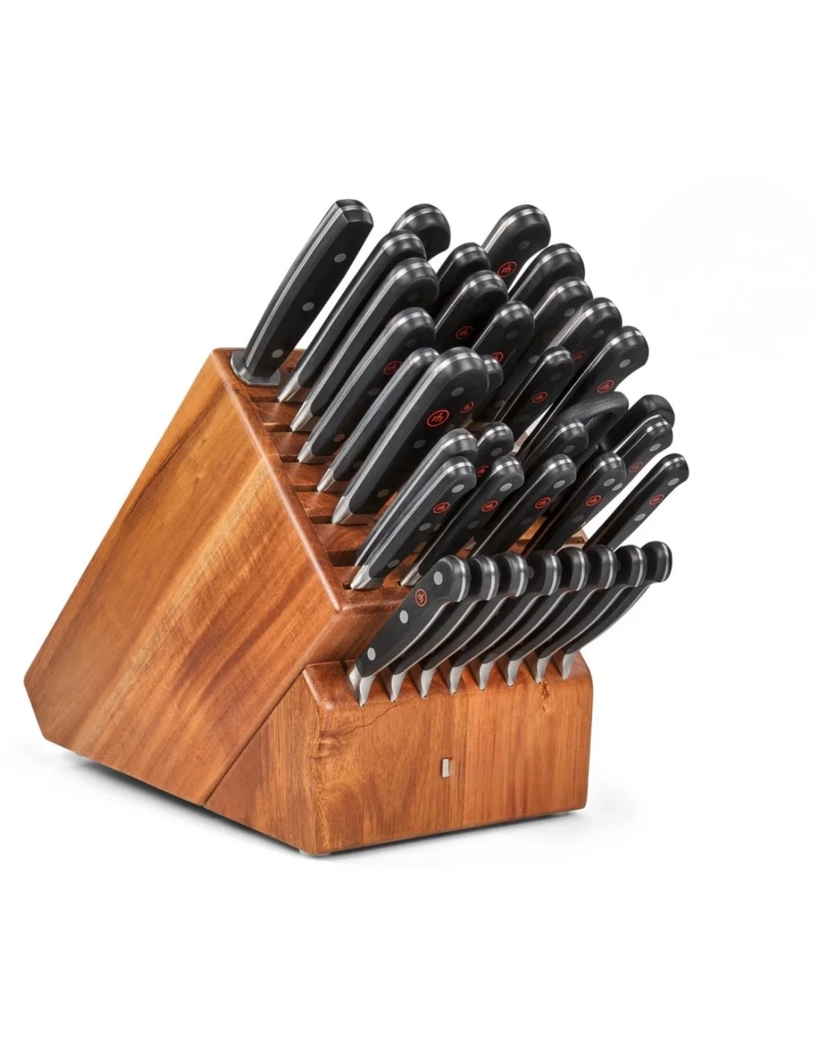 A wooden knife block holding multiple black-handled knives of different sizes.