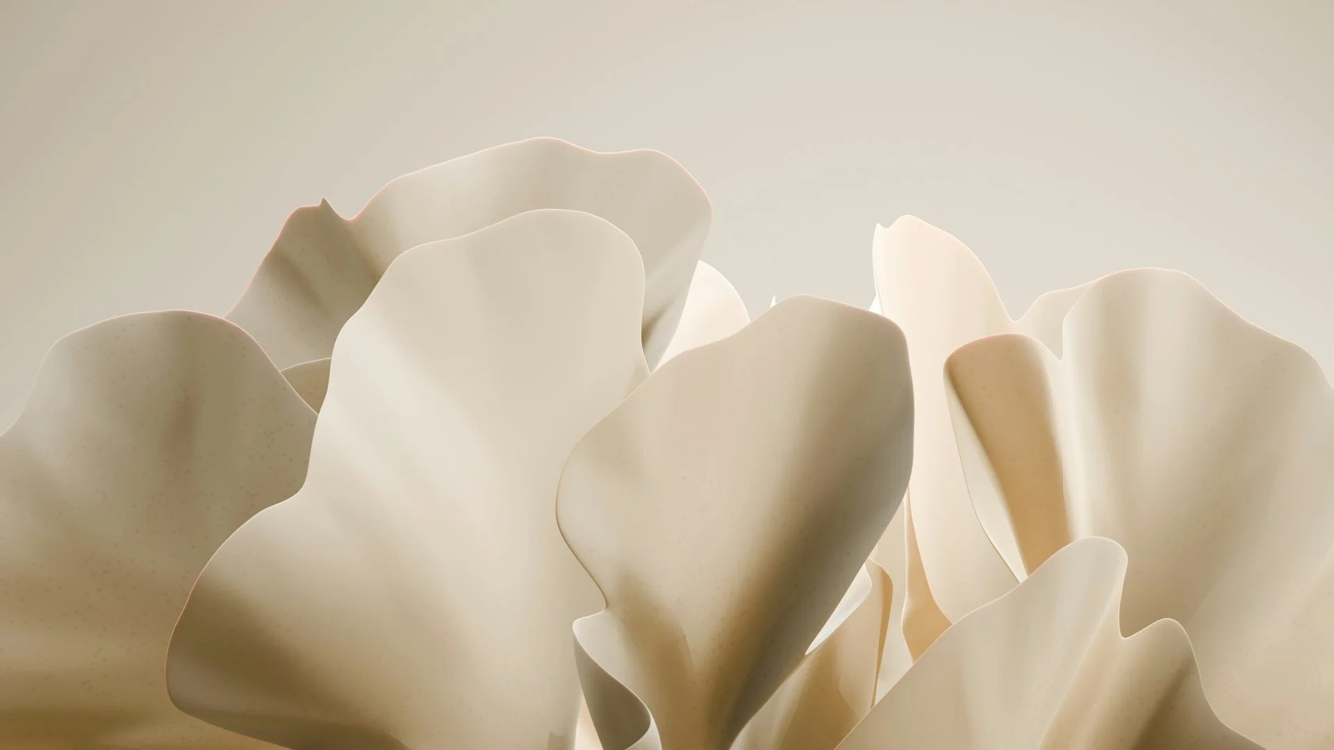 Close-up of cream-colored, layered, and wavy artificial flower petals with soft lighting and neutral background.