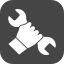Black and white illustration of a clenched fist.