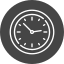 A clock showing the time as approximately 12:00.