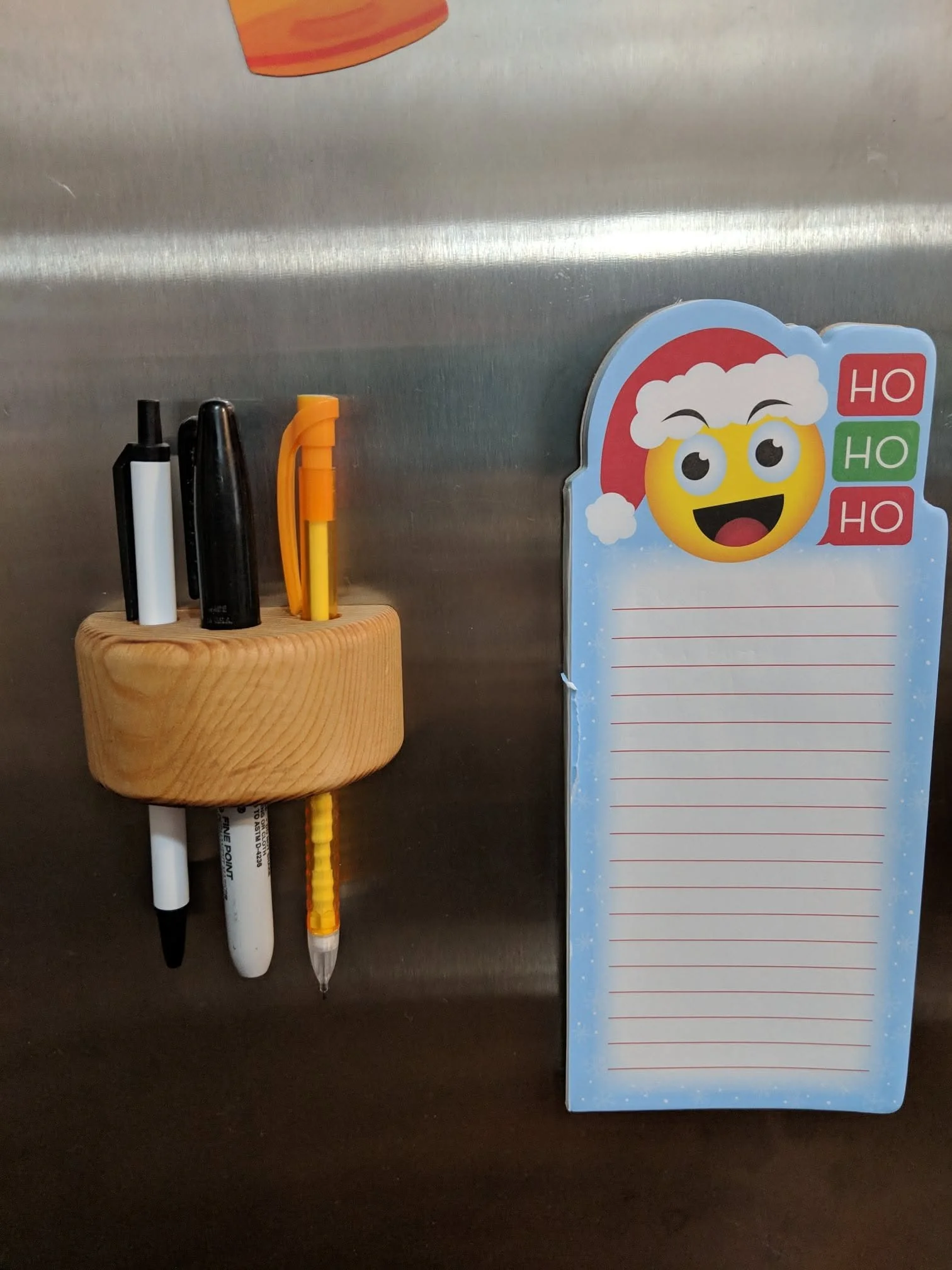 Magnetic fridge pen holder